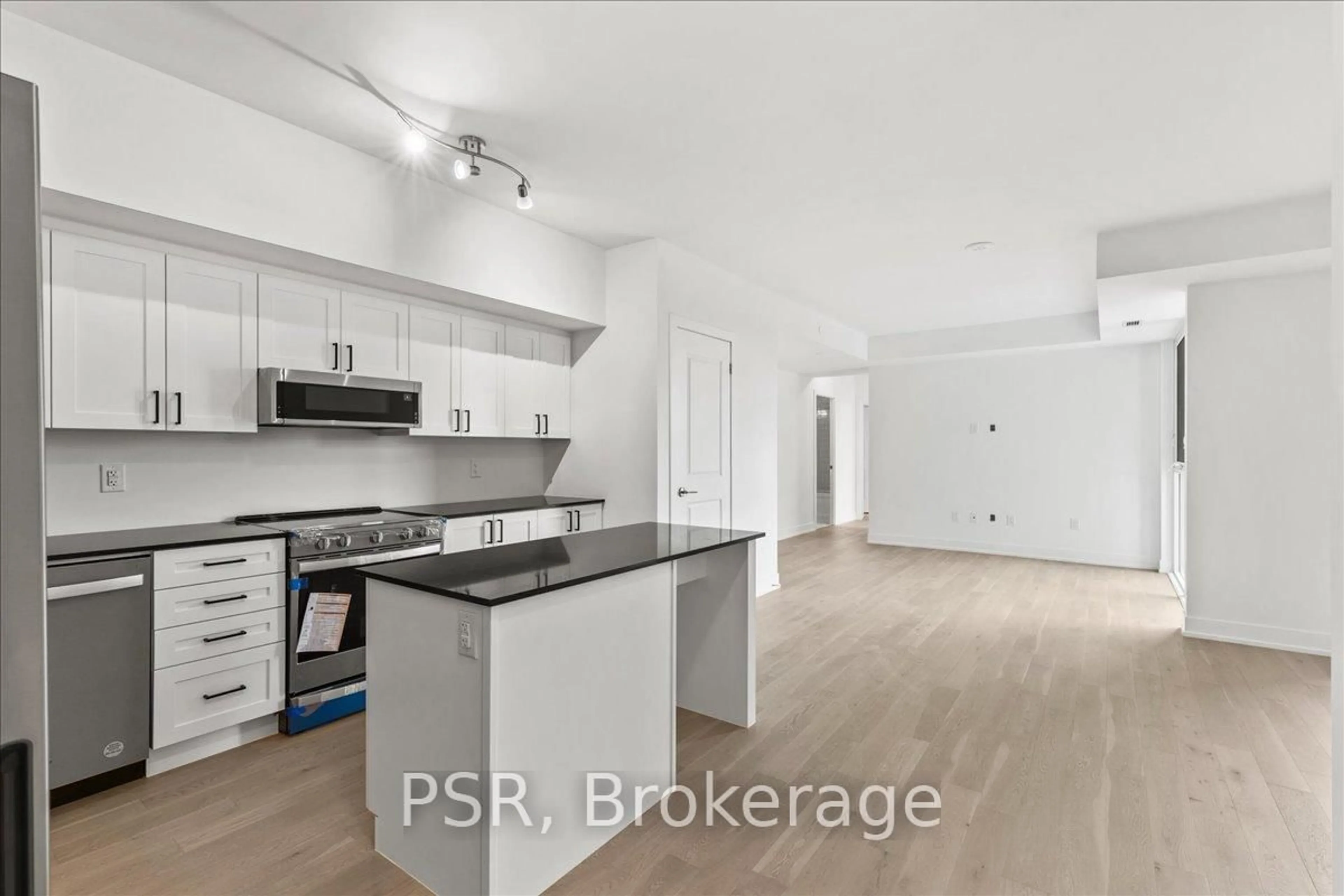 Open concept kitchen, unknown for 1063 Douglas Mccurdy Comm Circ #1008, Mississauga Ontario L5L 3H9