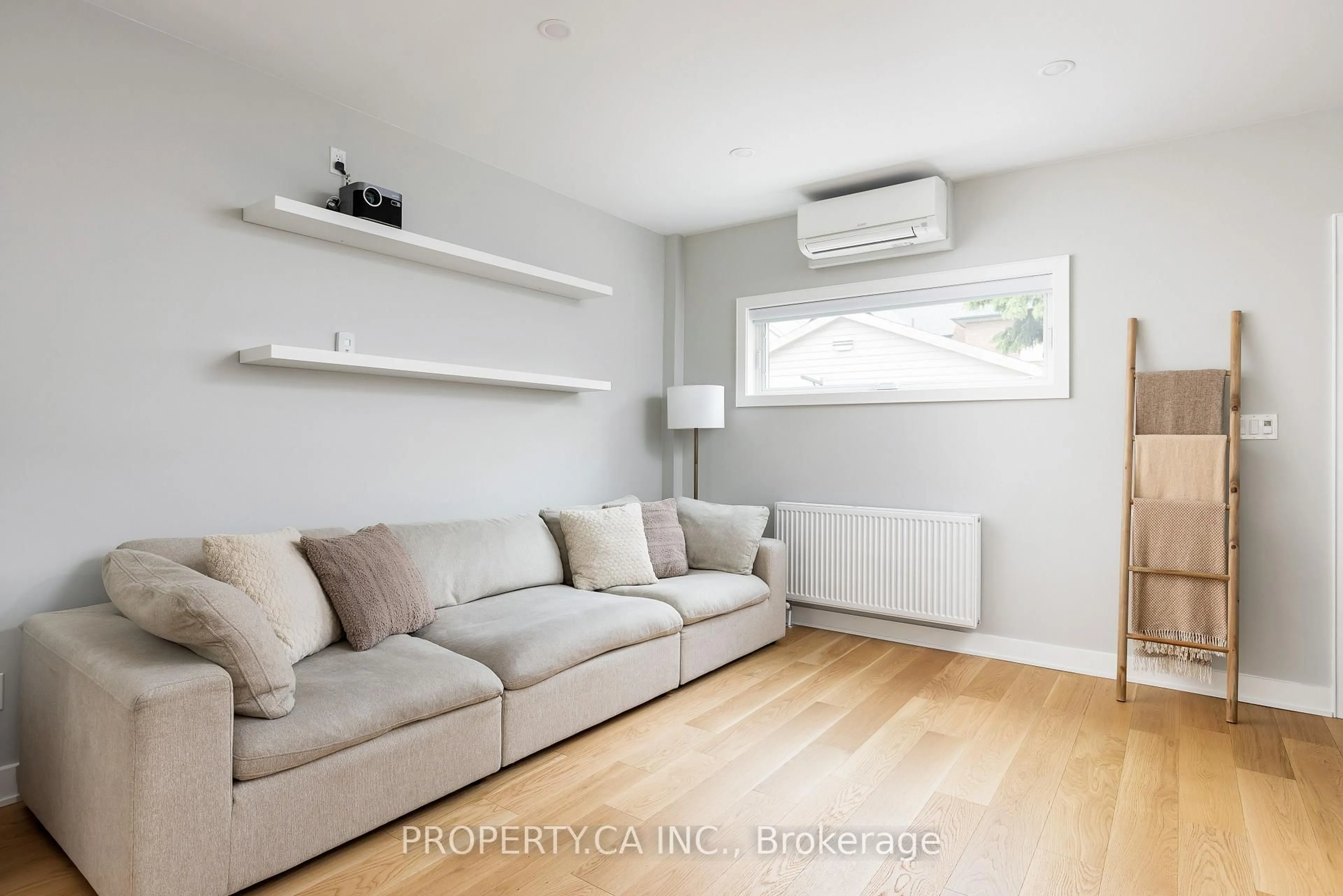 Living room with furniture, wood/laminate floor for 80 Marion St, Toronto Ontario M6R 1E7