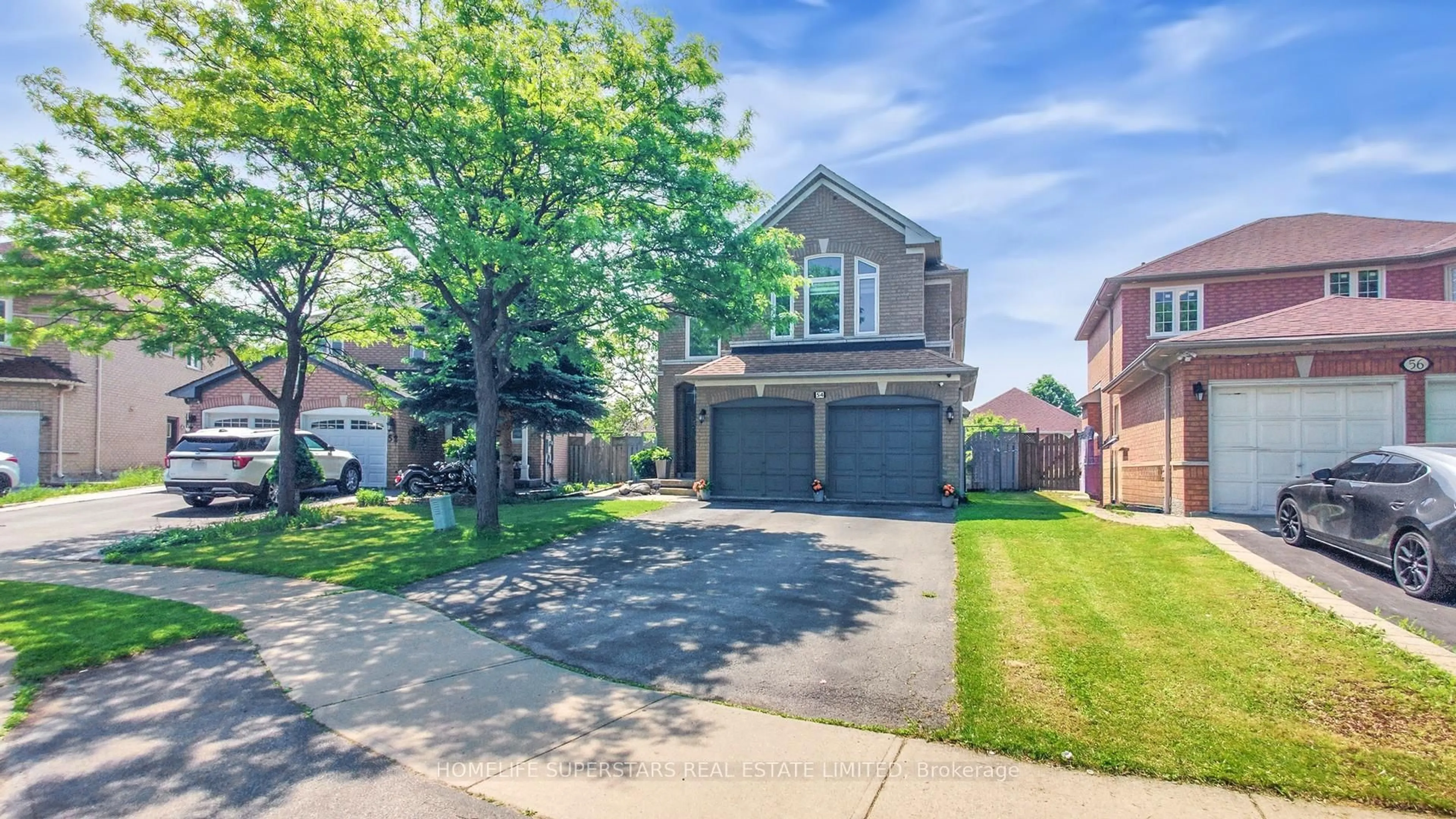 Home with brick exterior material, street for 54 Mount Mckinley Lane, Brampton Ontario L6R 2C2