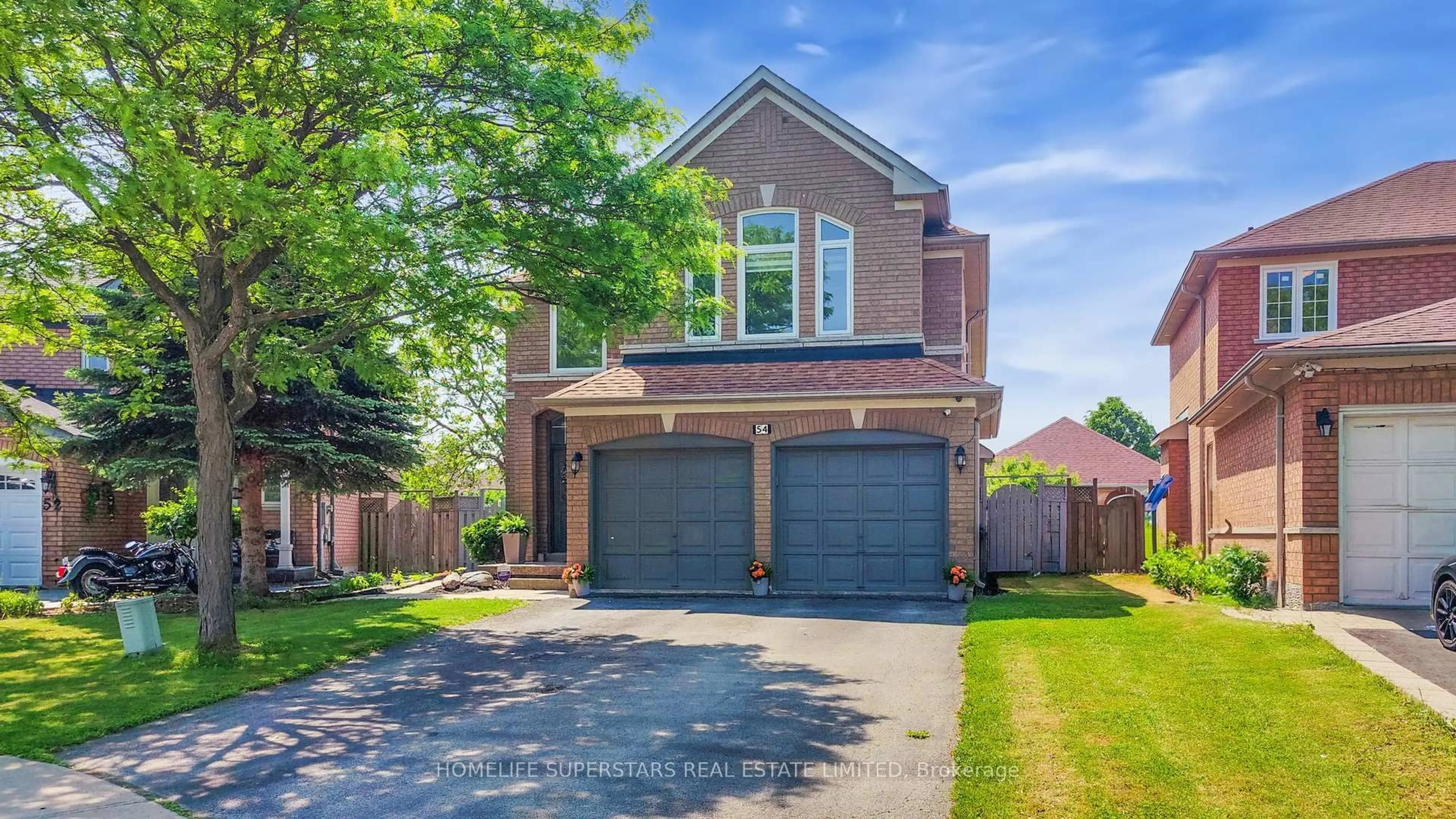 Home with brick exterior material, street for 54 Mount Mckinley Lane, Brampton Ontario L6R 2C2