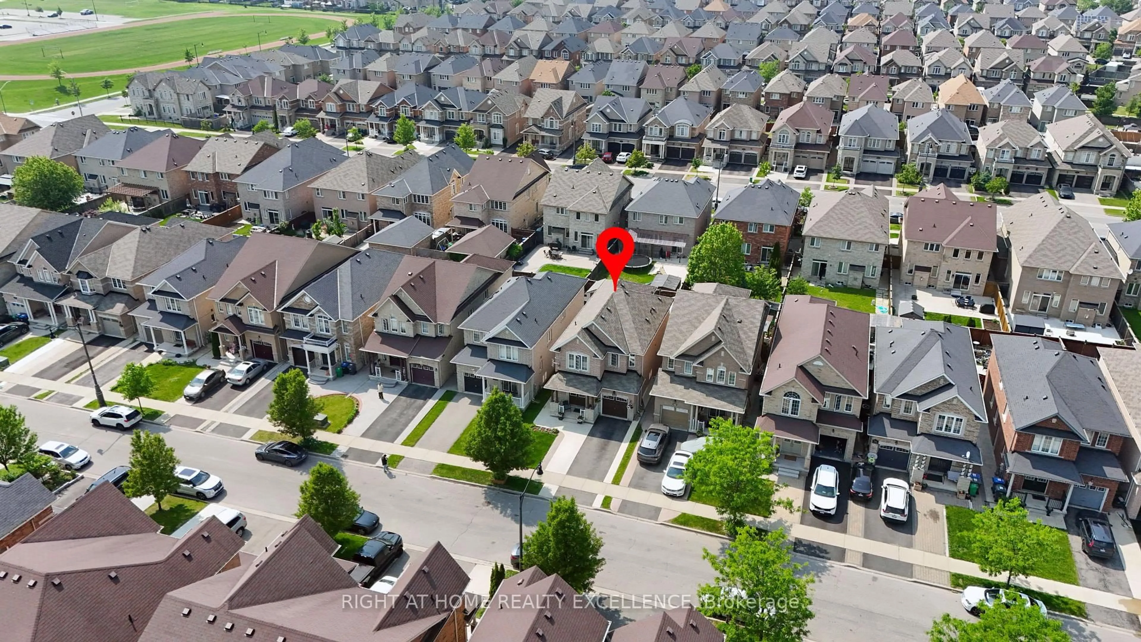 A pic from outside/outdoor area/front of a property/back of a property/a pic from drone, street for 32 Matthew Harrison St, Brampton Ontario L6P 3H1