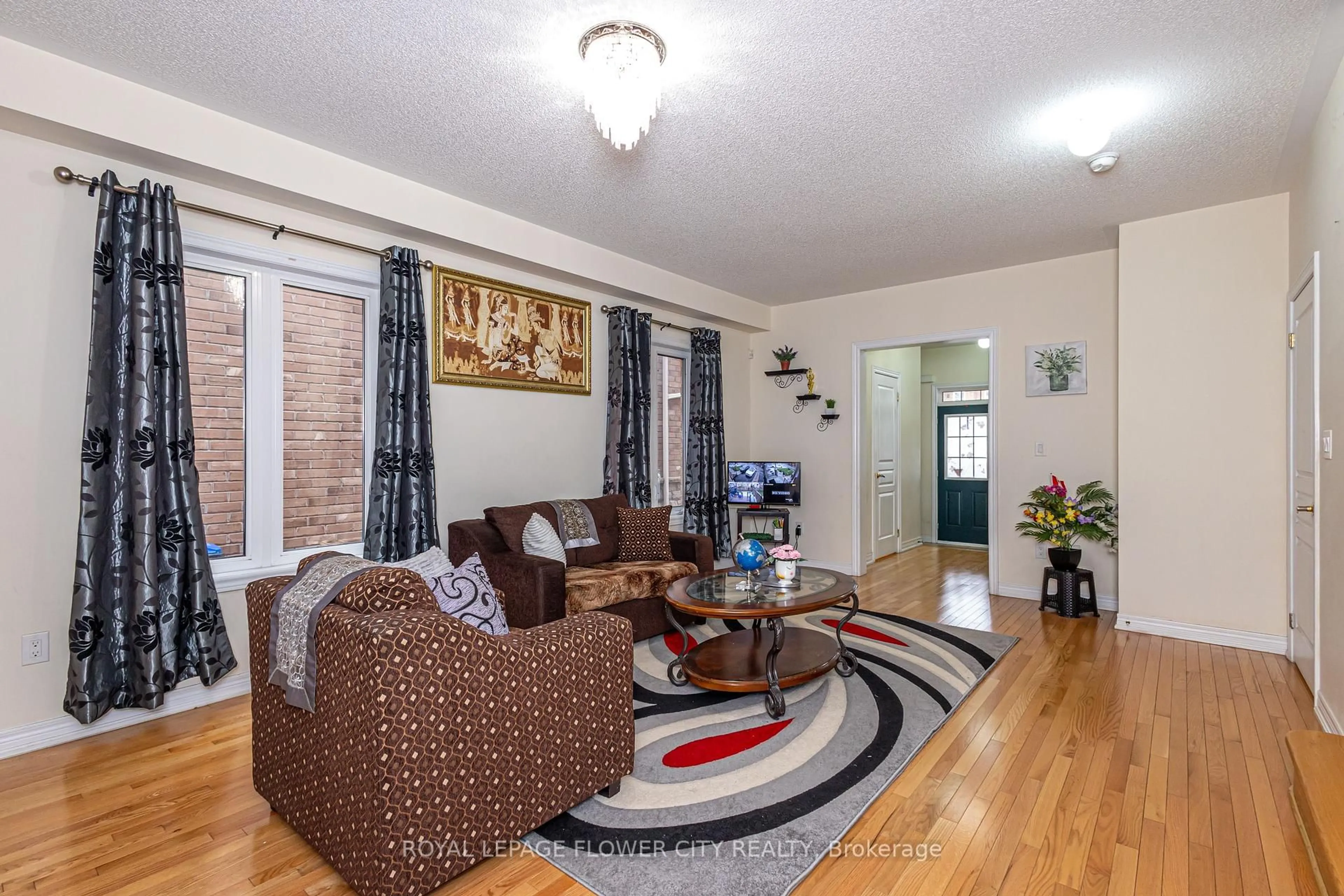 Living room with furniture, unknown for 8 Washburn Rd, Brampton Ontario L6P 3V7