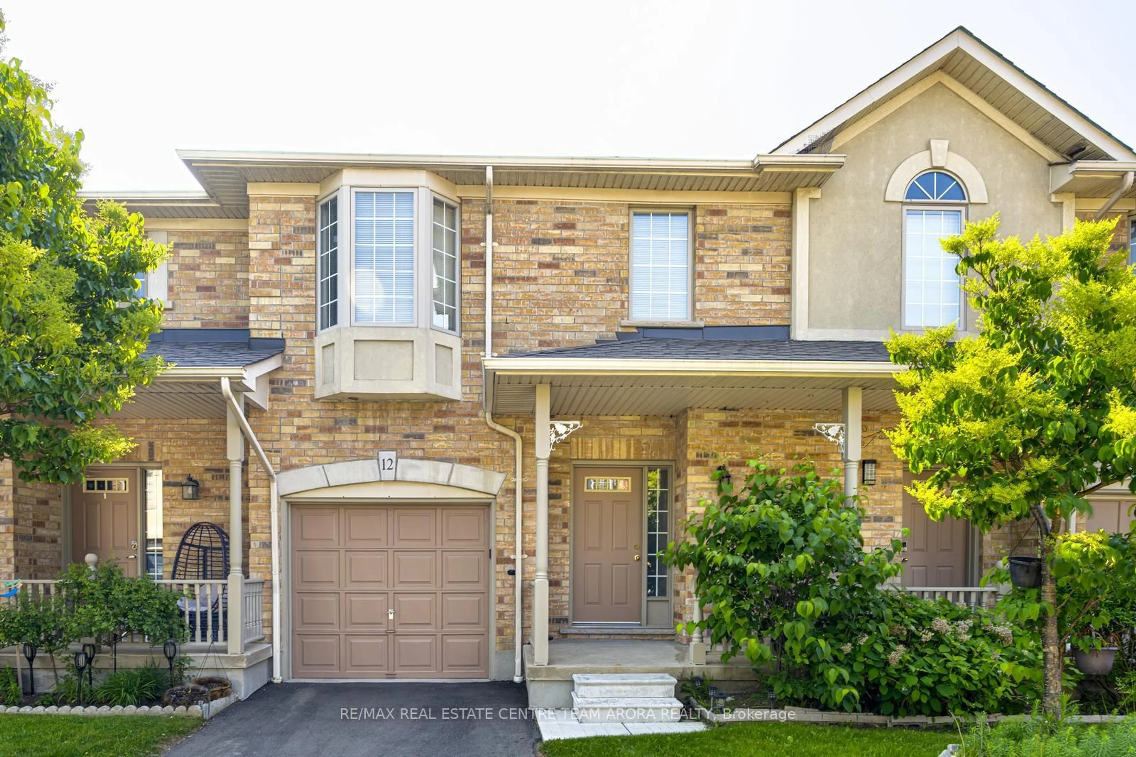 Home with brick exterior material, street for 7385 Magistrate Terr #12, Mississauga Ontario L5W 1W8