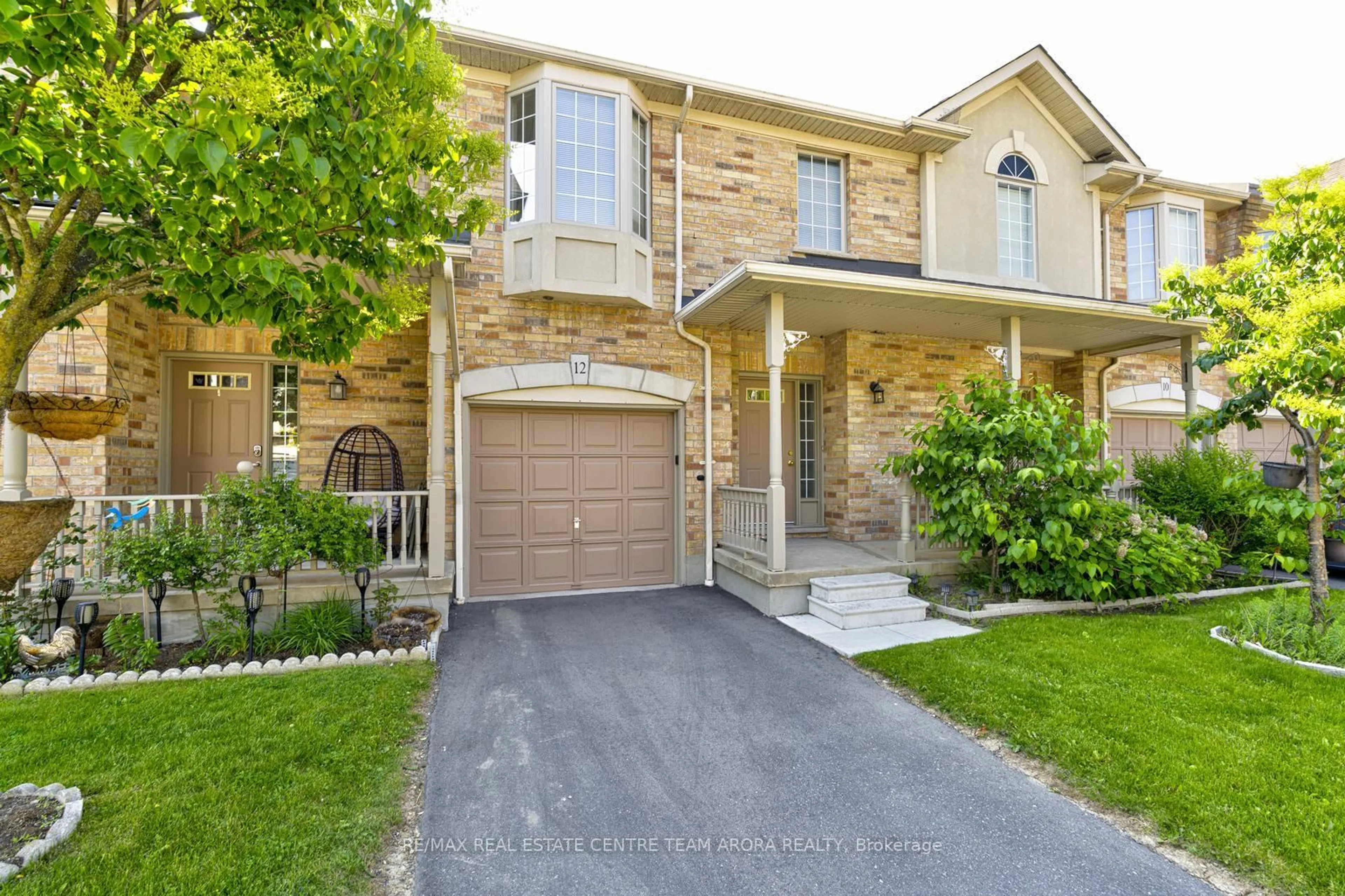 Home with brick exterior material, street for 7385 Magistrate Terr #12, Mississauga Ontario L5W 1W8
