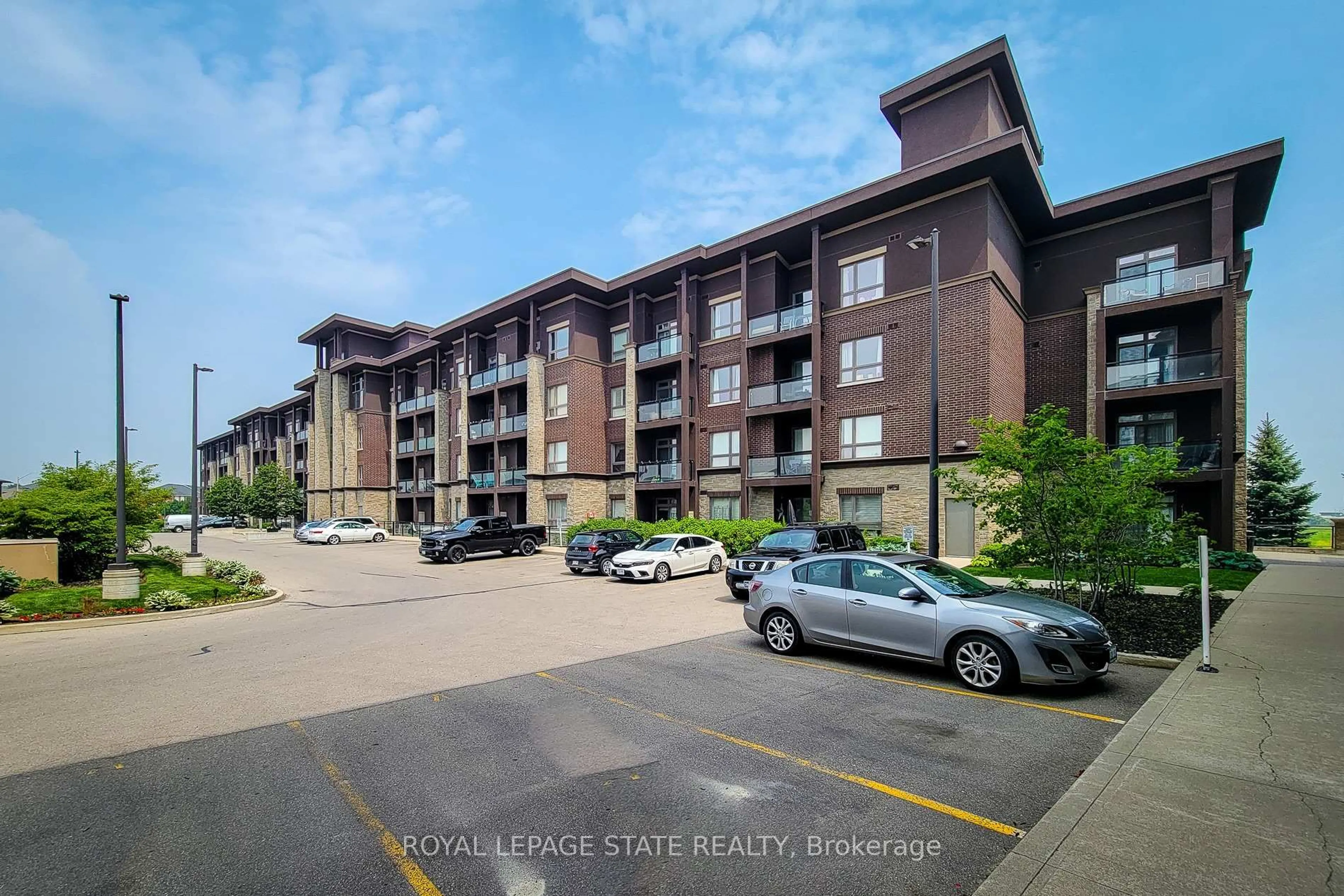 A pic from outside/outdoor area/front of a property/back of a property/a pic from drone, street for 5010 Corporate Dr #320, Burlington Ontario L7L 0H6