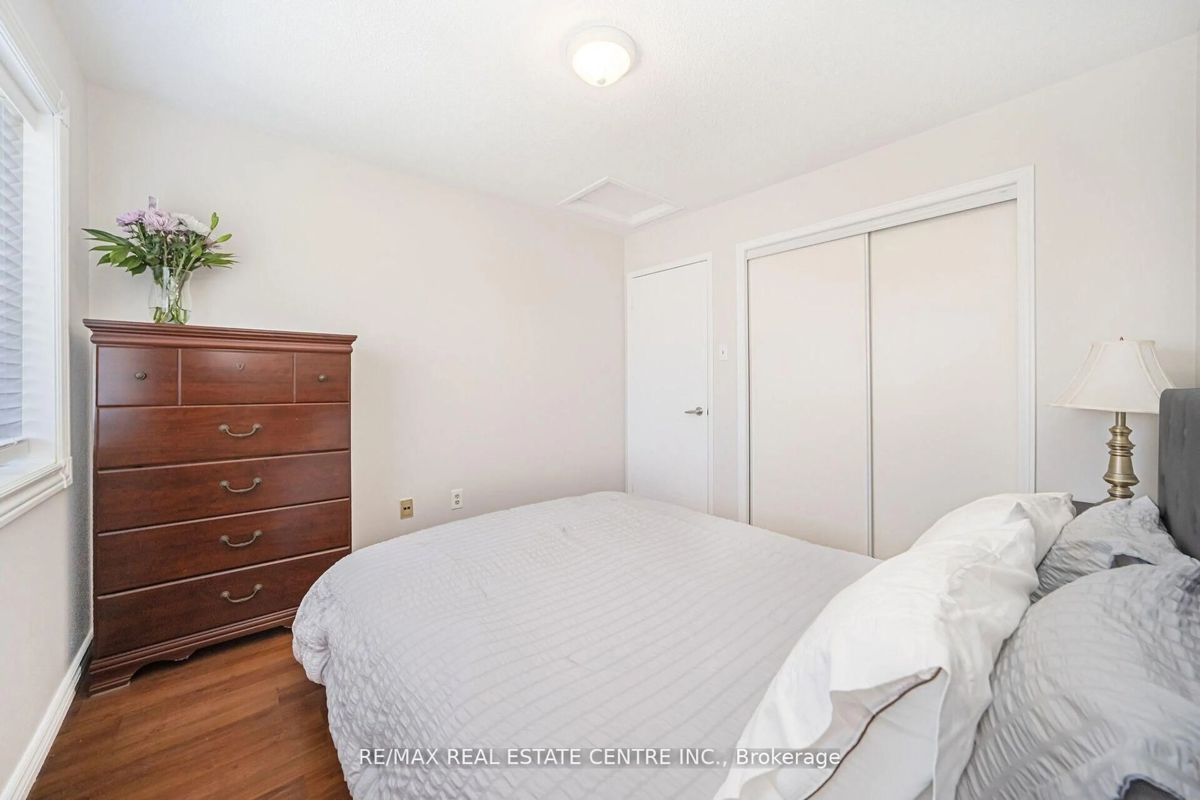 Bedroom with bed, wood/laminate floor for 36 Lockwood Rd, Brampton Ontario L6Y 4T7