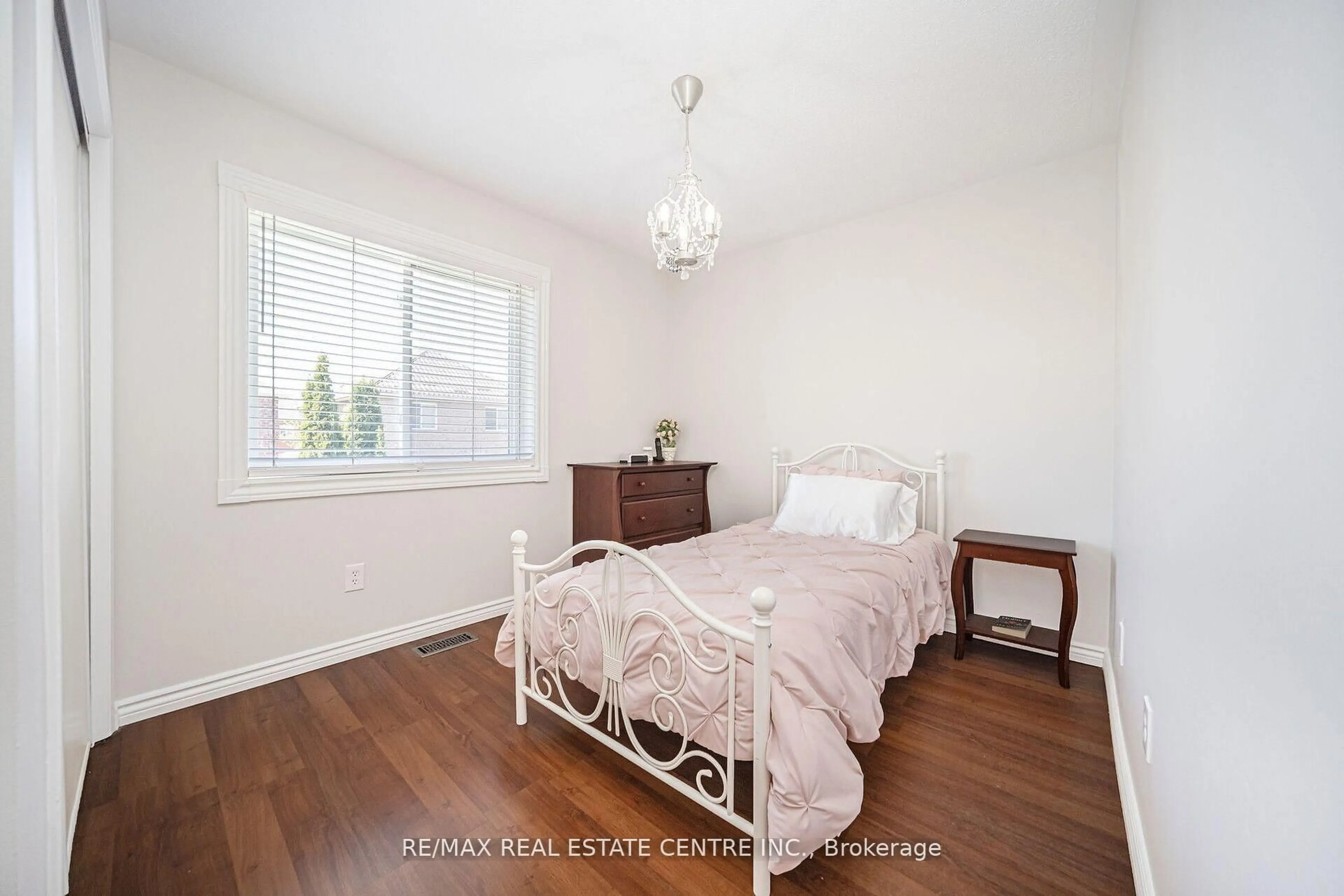 Bedroom with bed, wood/laminate floor for 36 Lockwood Rd, Brampton Ontario L6Y 4T7