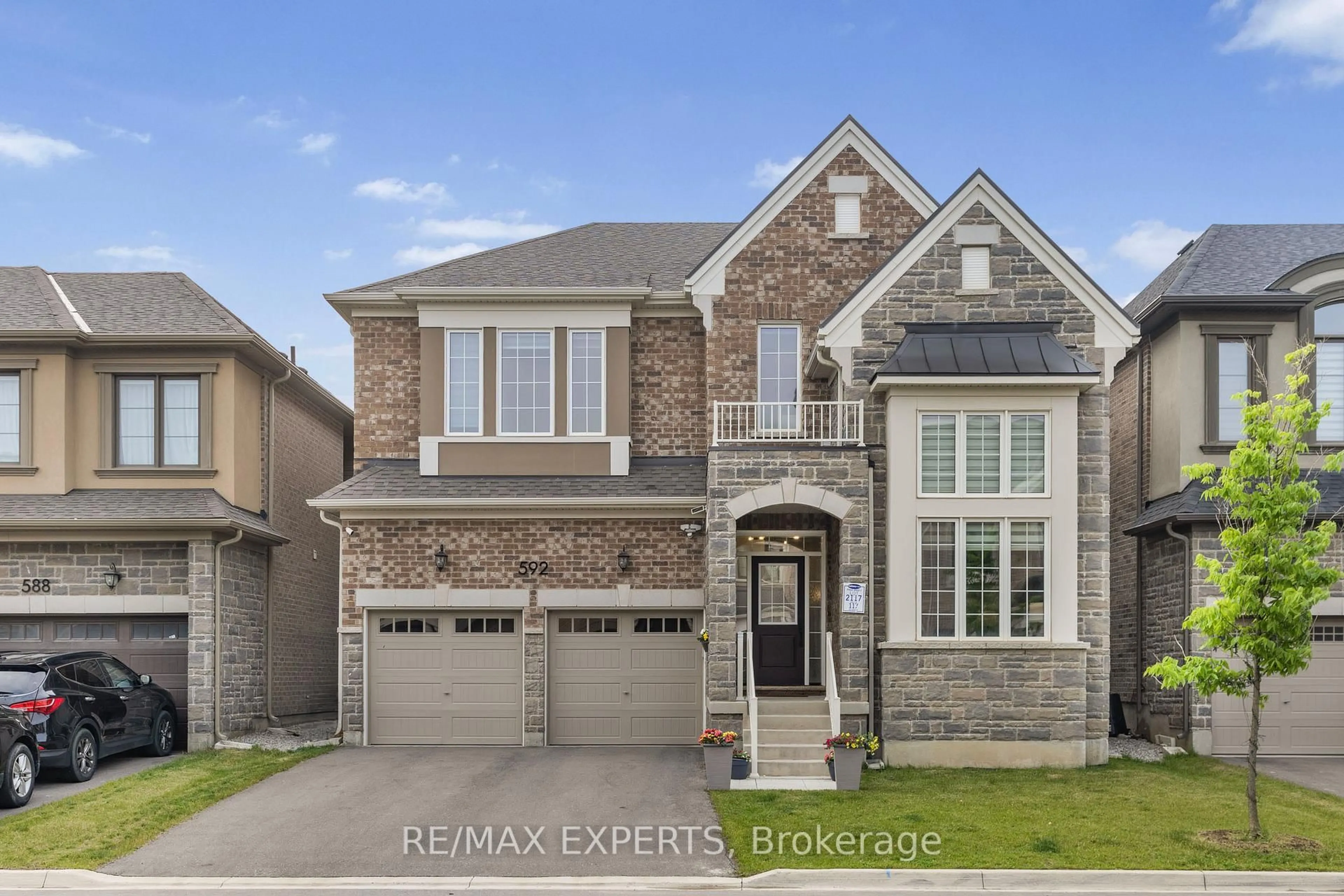 Home with brick exterior material, street for 592 Boyd Lane, Milton Ontario L9E 1W6