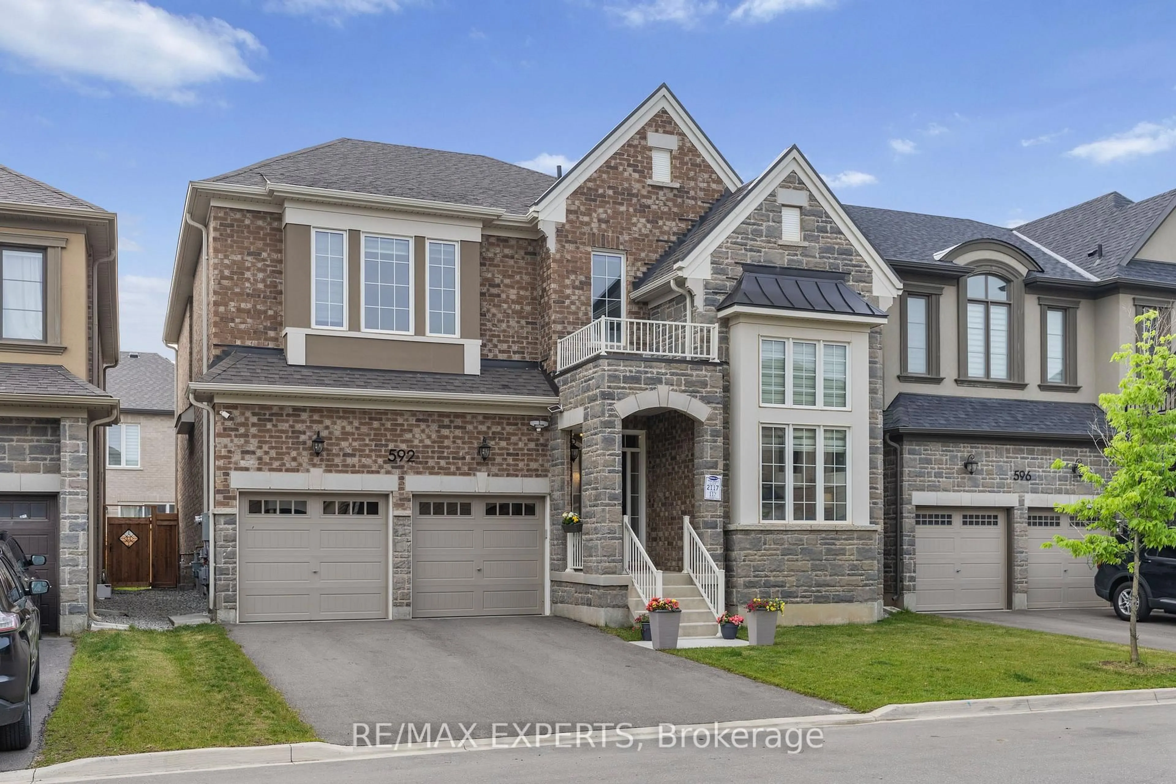 Home with brick exterior material, street for 592 Boyd Lane, Milton Ontario L9E 1W6