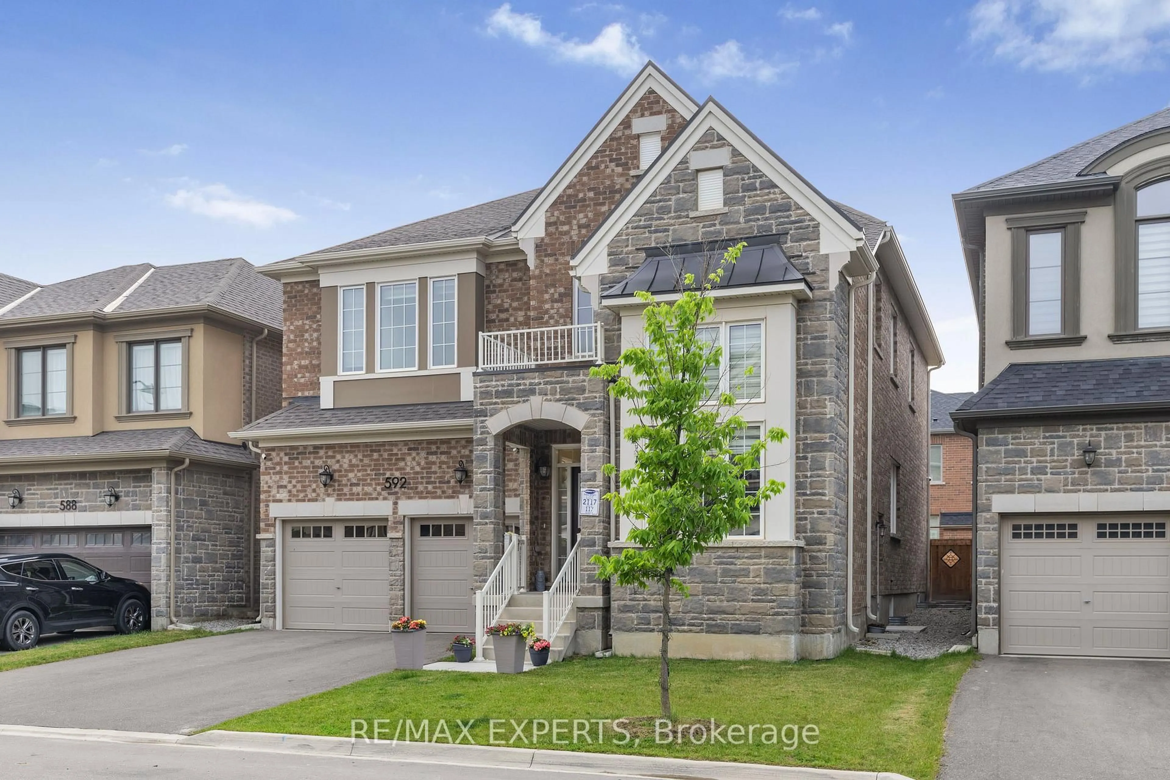 Home with brick exterior material, street for 592 Boyd Lane, Milton Ontario L9E 1W6