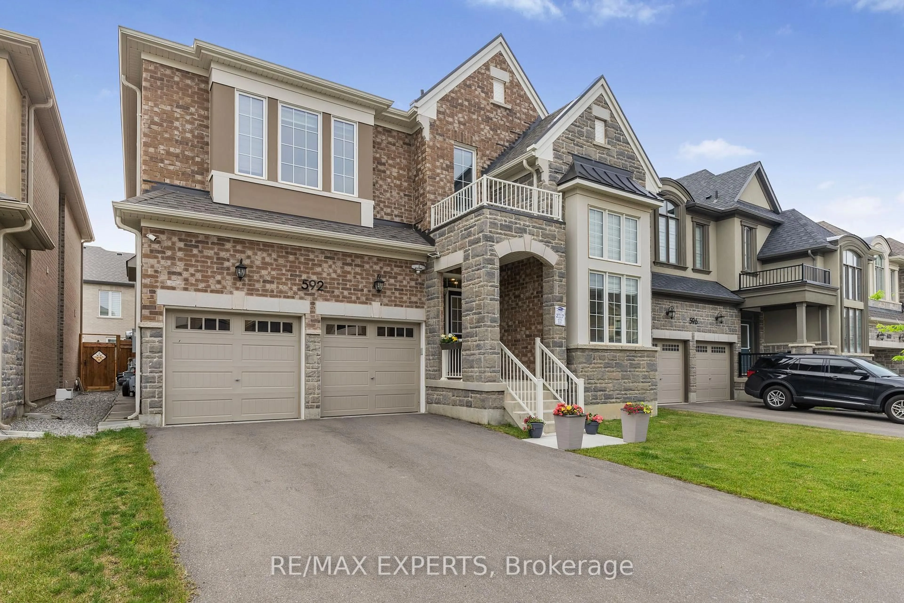 Home with brick exterior material, street for 592 Boyd Lane, Milton Ontario L9E 1W6
