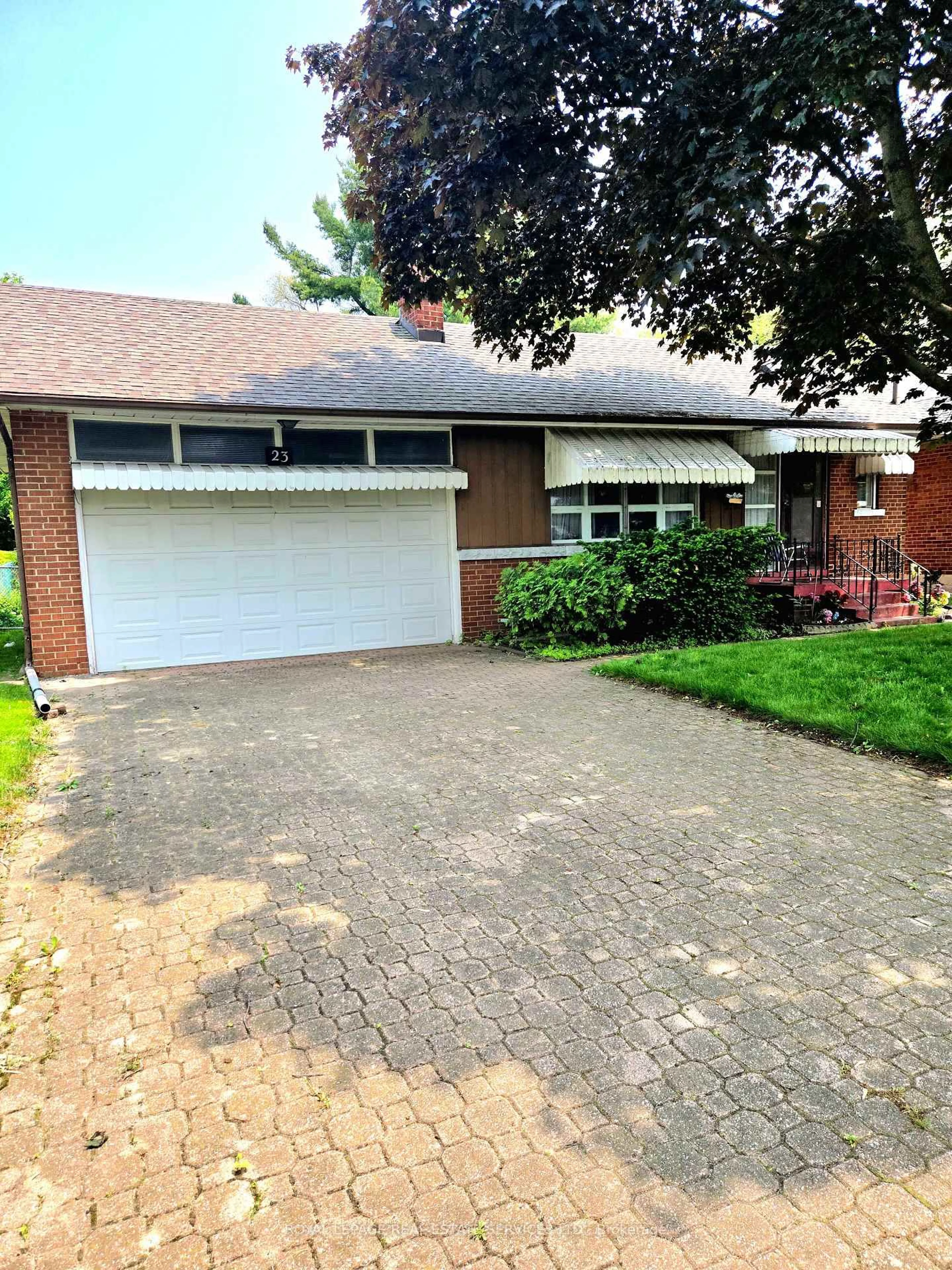 Home with brick exterior material, street for 23 Sevenoaks Ave, Toronto Ontario M8Z 3P6