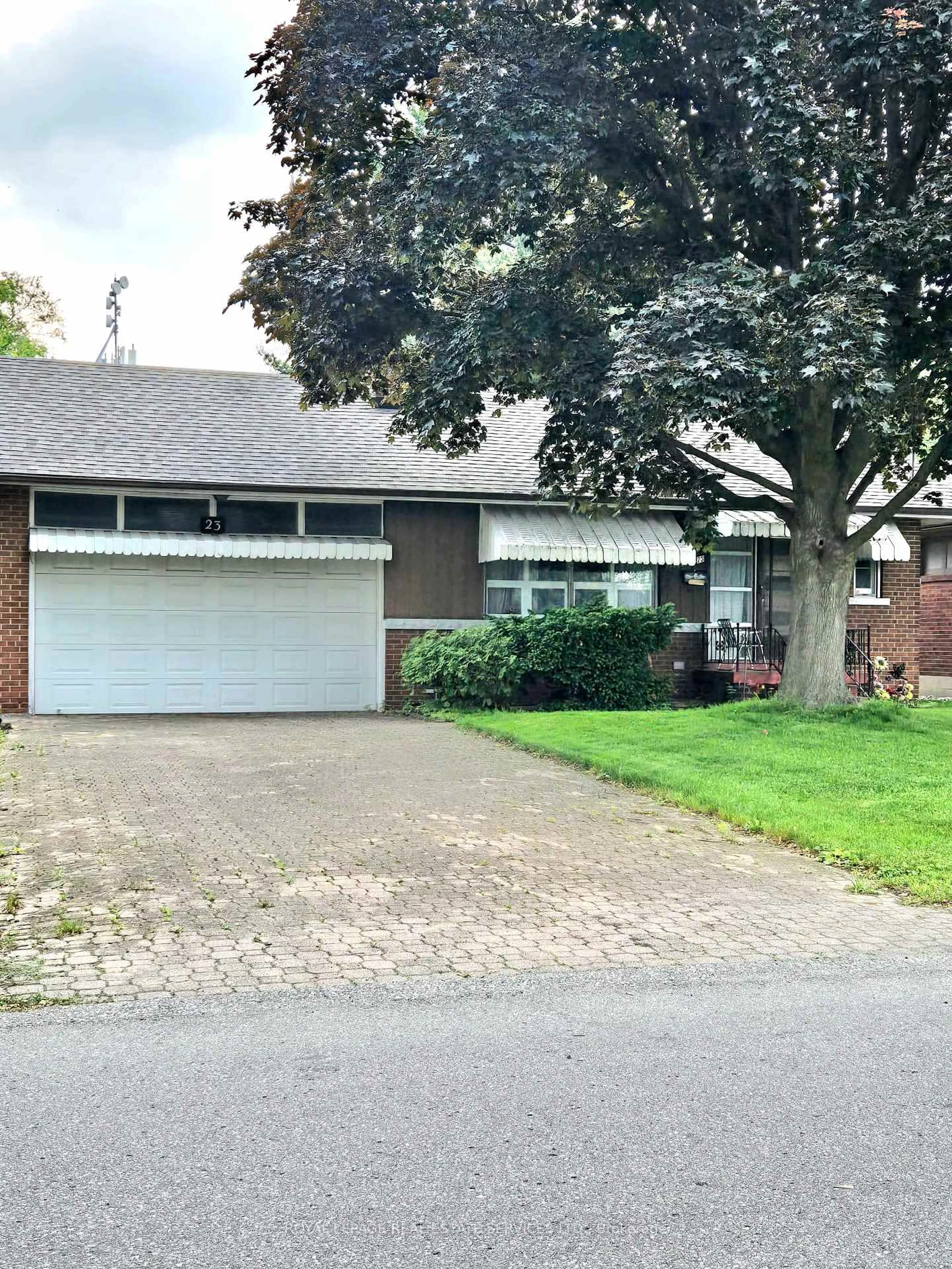 Home with brick exterior material, street for 23 Sevenoaks Ave, Toronto Ontario M8Z 3P6