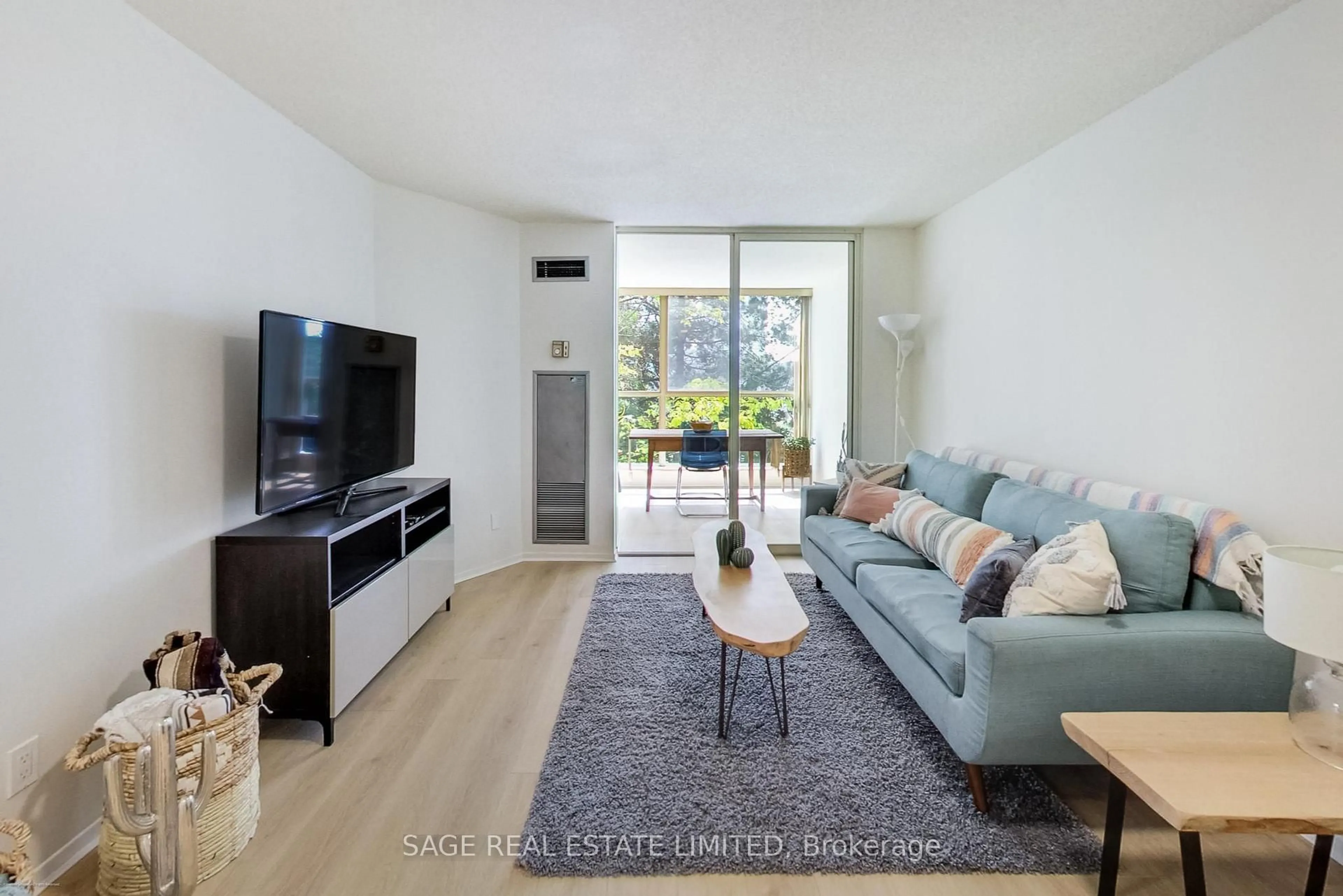 Living room with furniture, unknown for 20 Southport St #309, Toronto Ontario M6S 4Y8