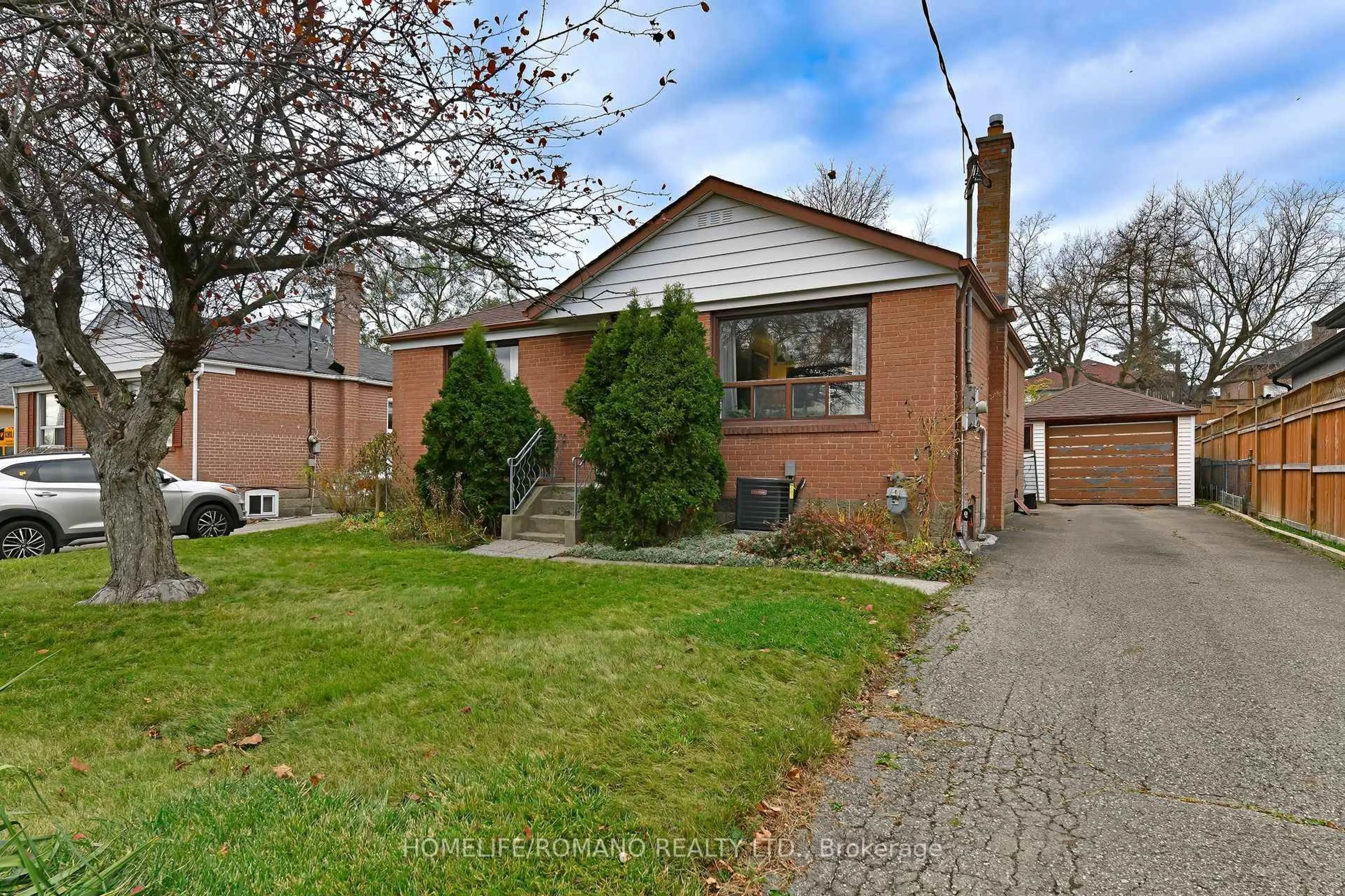 Home with brick exterior material, street for 238 Epsom Downs Dr, Toronto Ontario M3M 1T4