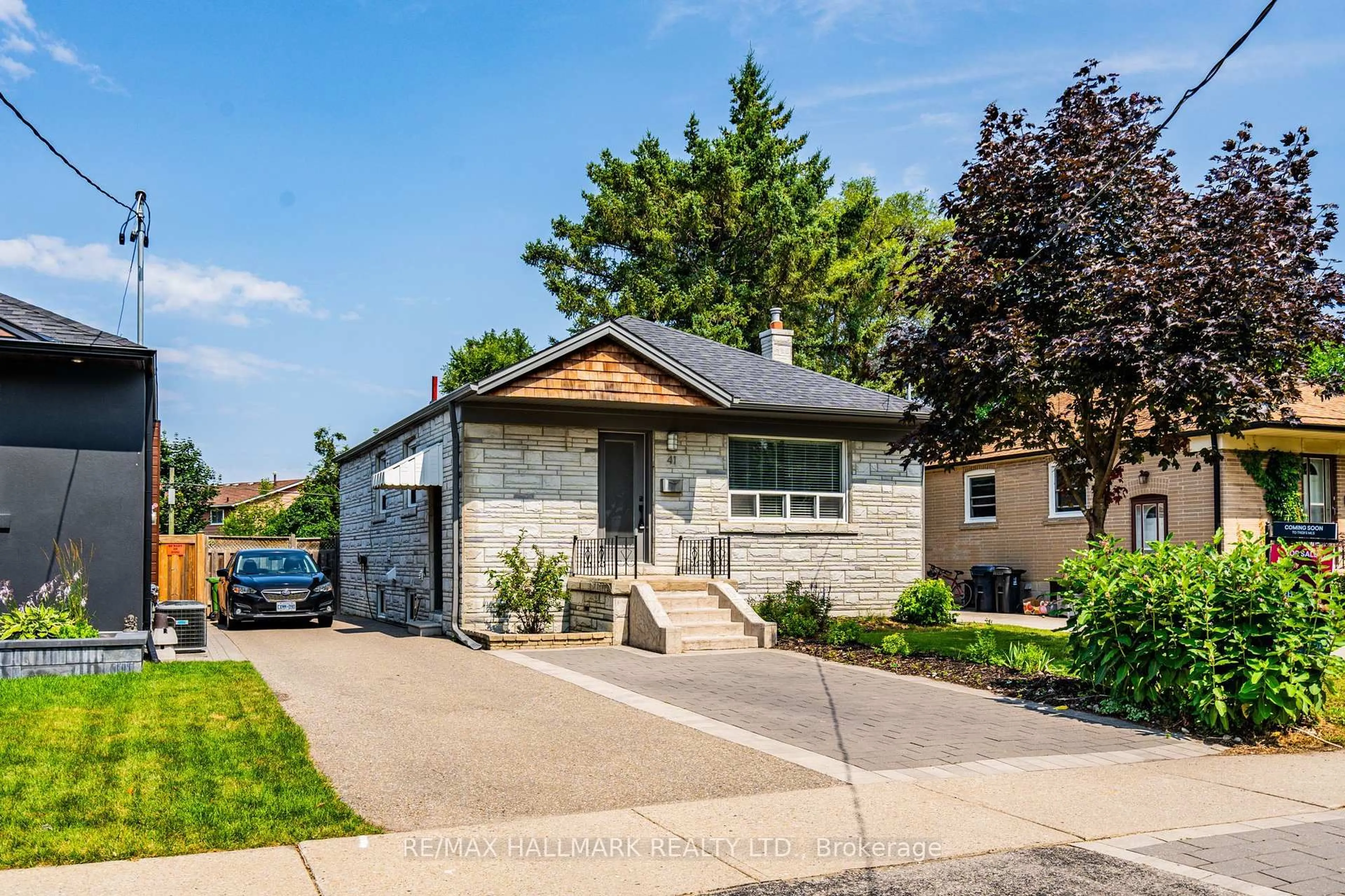 Home with brick exterior material, street for 41 Treeview Dr, Toronto Ontario M8W 4C1
