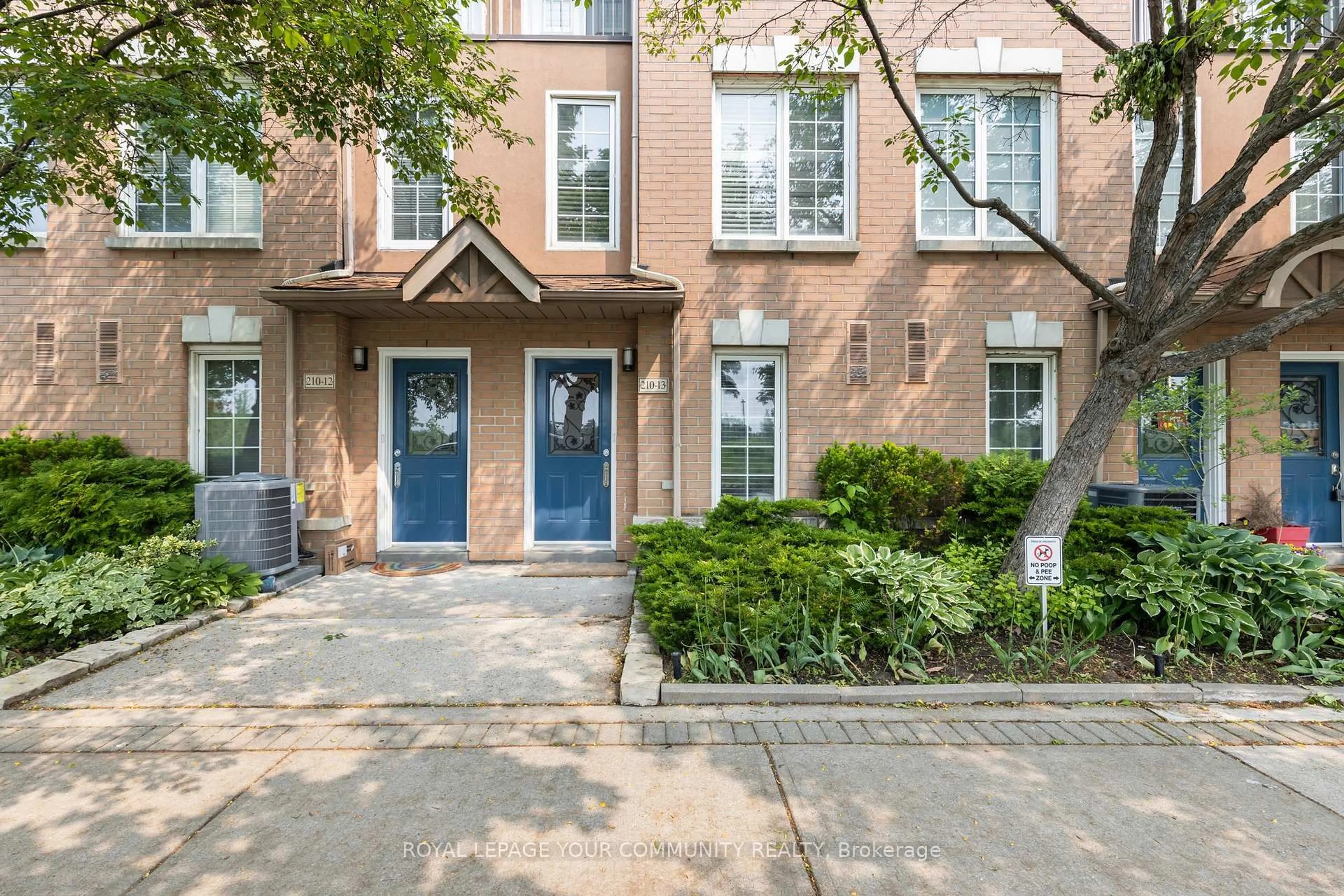 Home with brick exterior material, street for 210 Manitoba St #13, Toronto Ontario M8Y 4G7