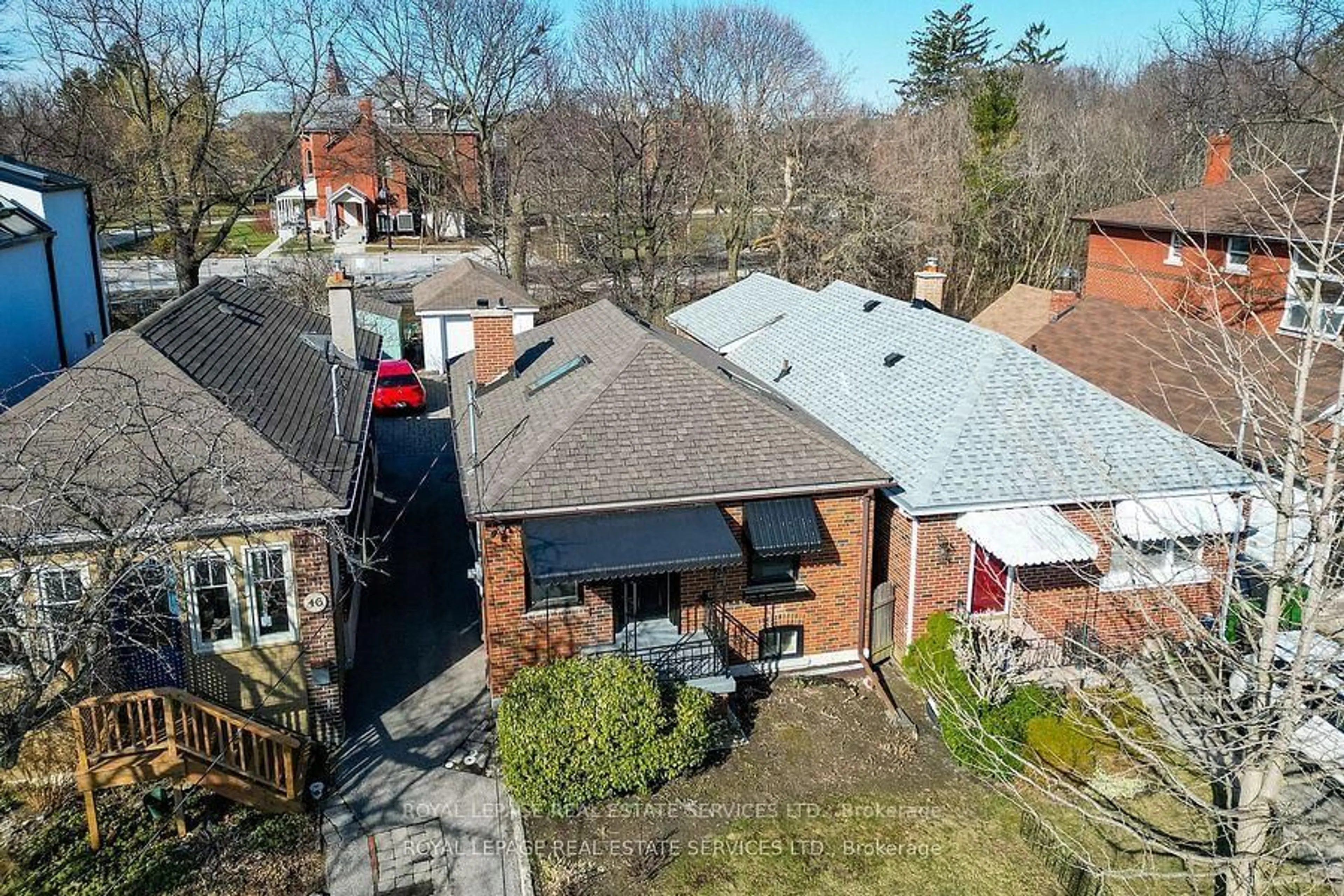 A pic from outside/outdoor area/front of a property/back of a property/a pic from drone, street for 48 Thirteenth St, Toronto Ontario M8V 3H4