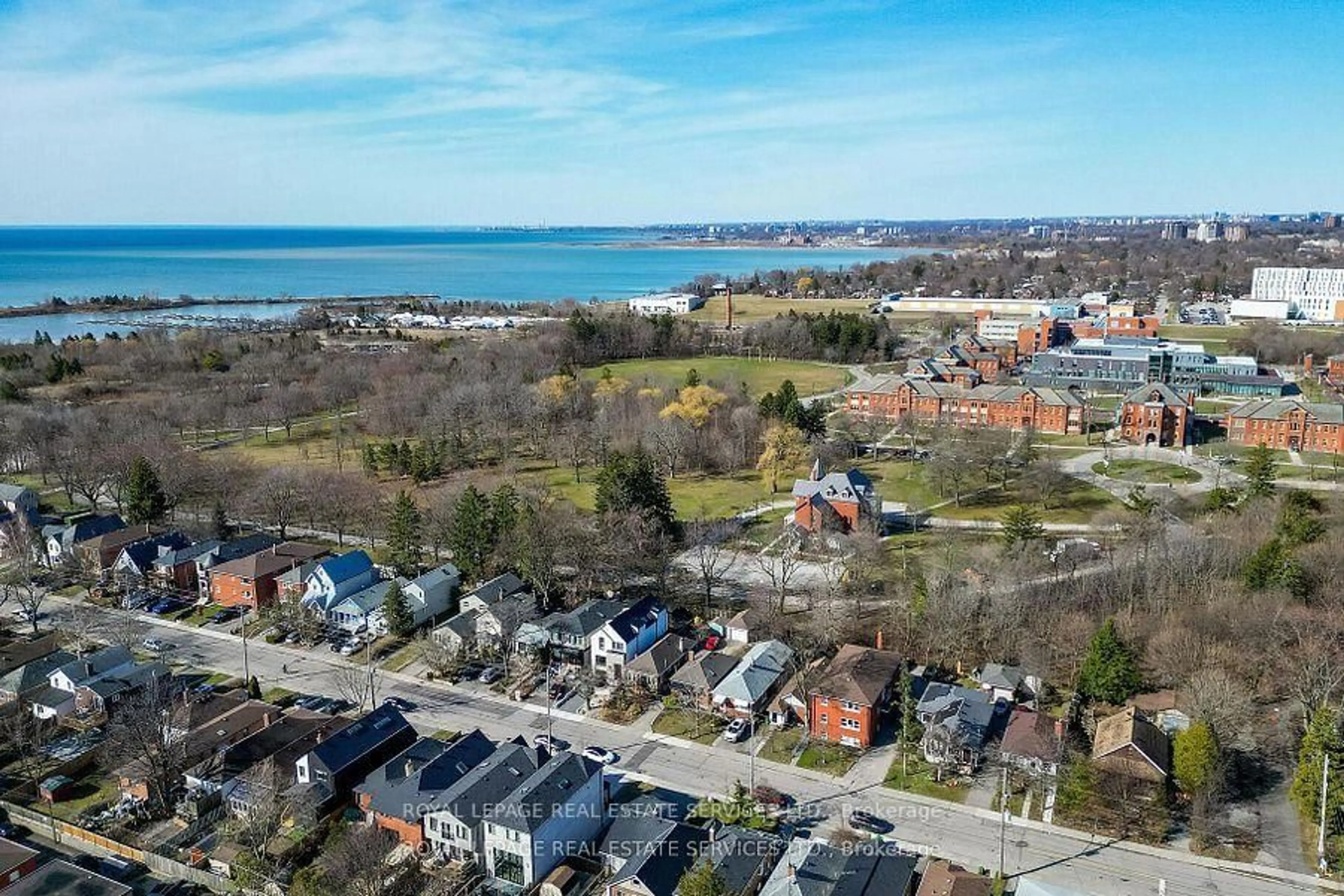 A pic from outside/outdoor area/front of a property/back of a property/a pic from drone, water/lake/river/ocean view for 48 Thirteenth St, Toronto Ontario M8V 3H4