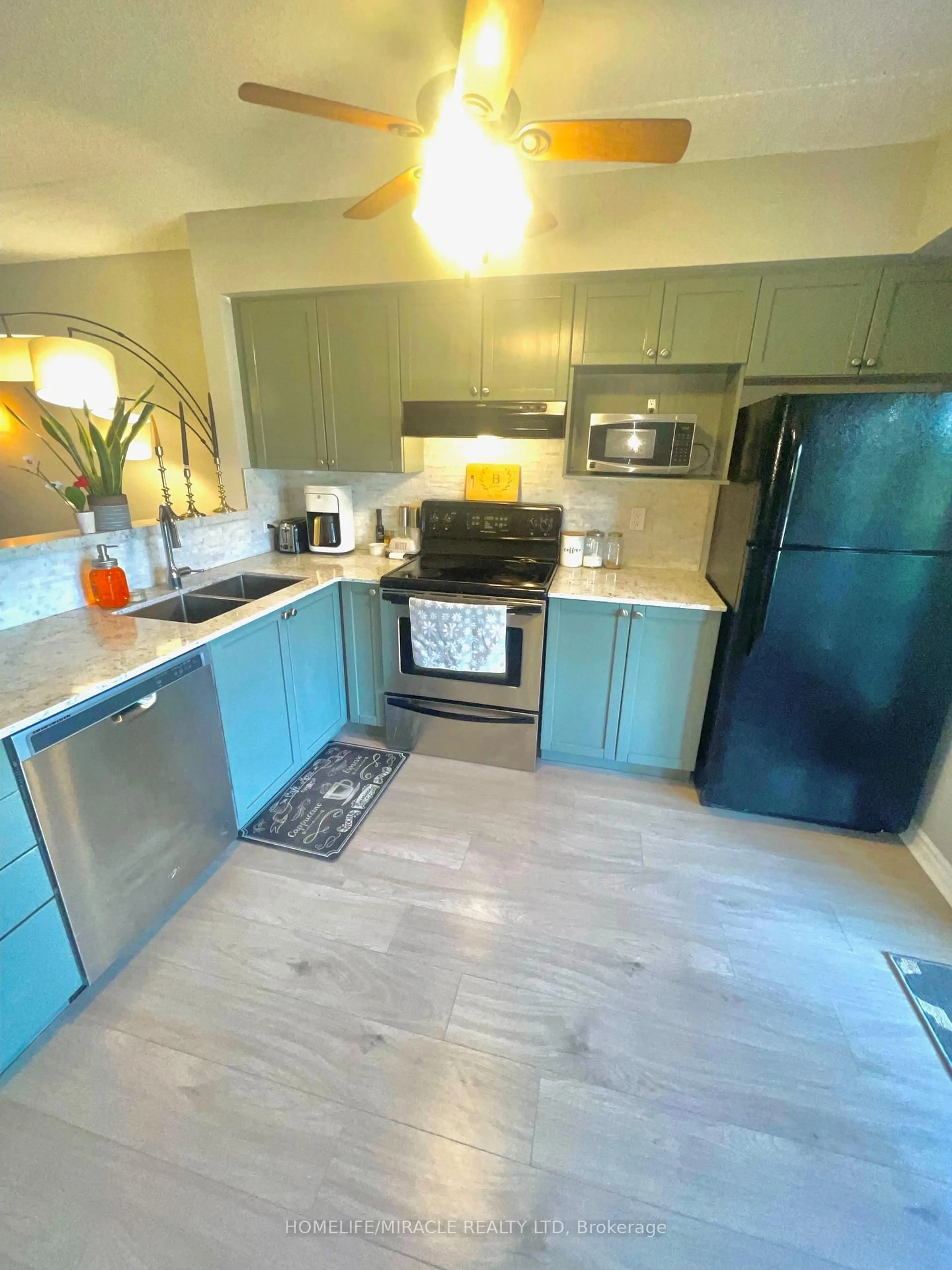 Open concept kitchen, unknown for 1411 Walker's Line #105, Burlington Ontario L7M 4P5