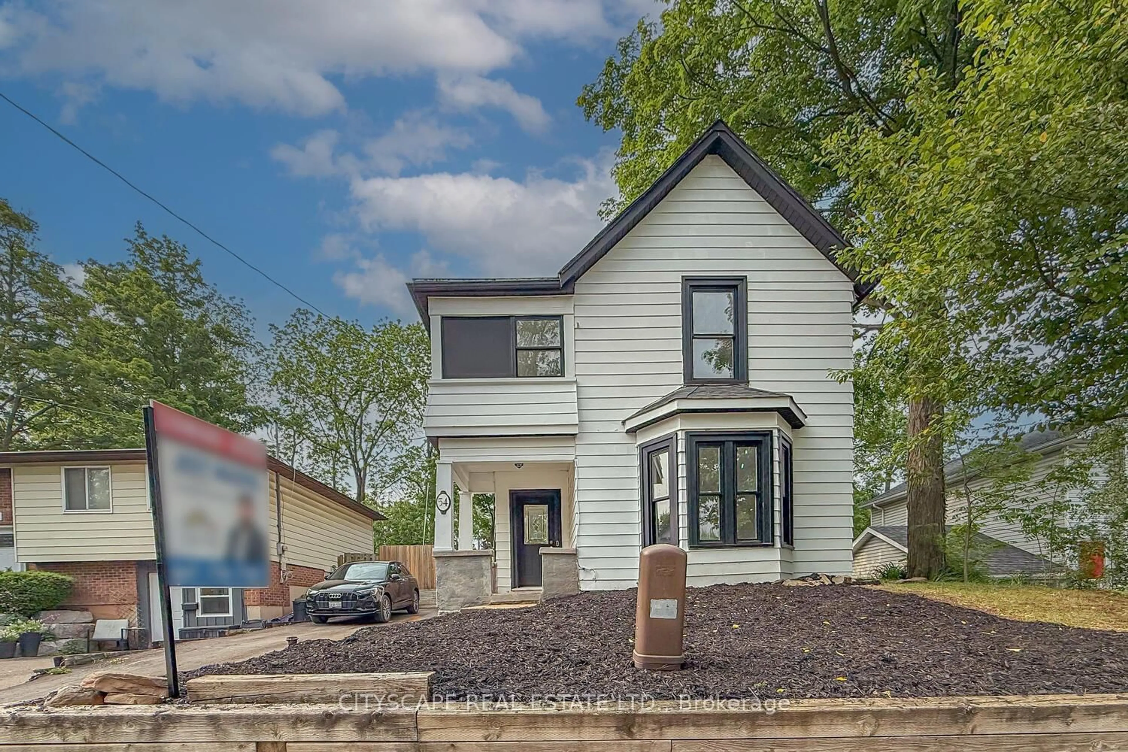 Home with brick exterior material, street for 54 Dayfoot Dr, Halton Hills Ontario L7G 2L1