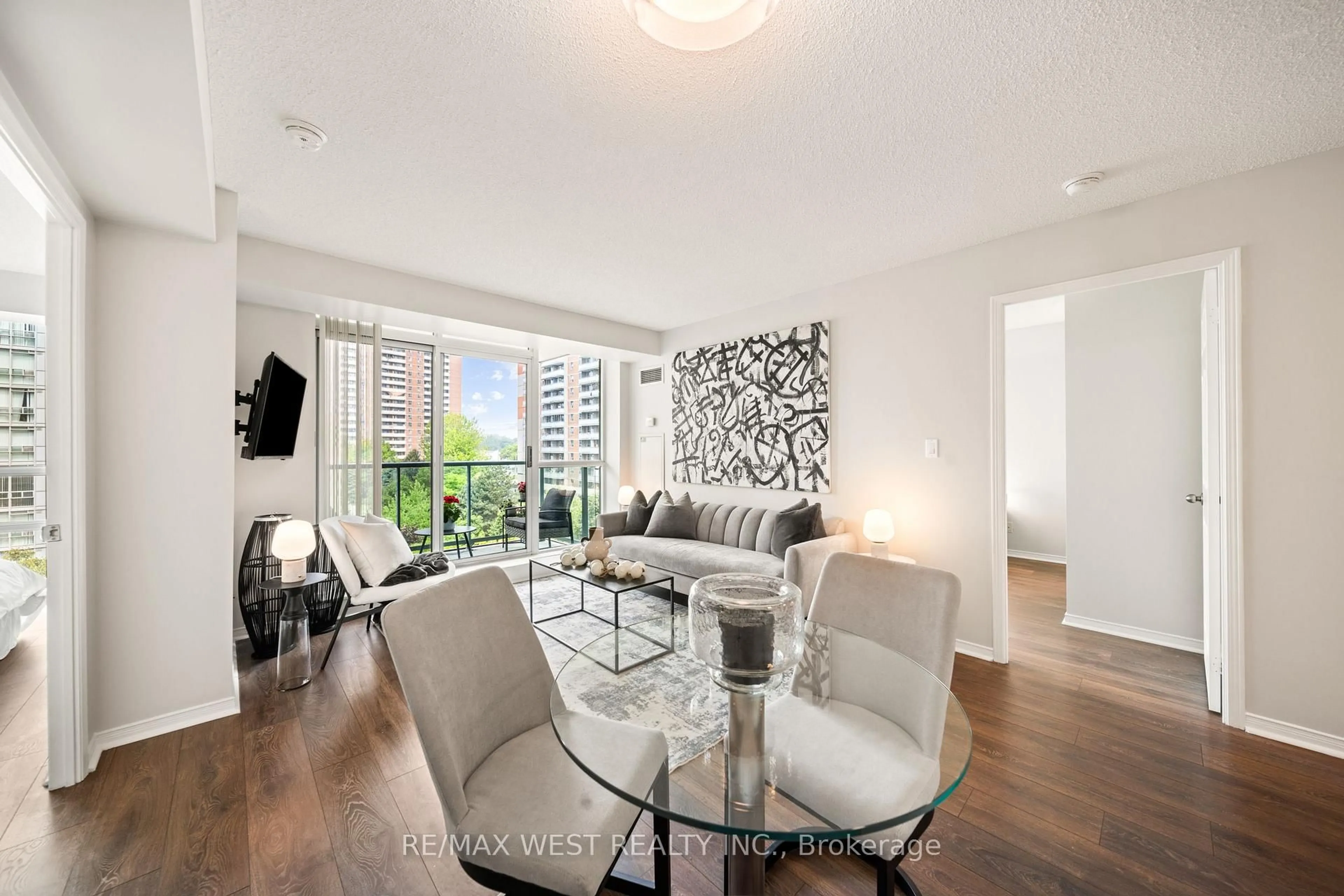 Living room with furniture, unknown for 7 Michael Power Pl #502, Toronto Ontario M9A 0A4