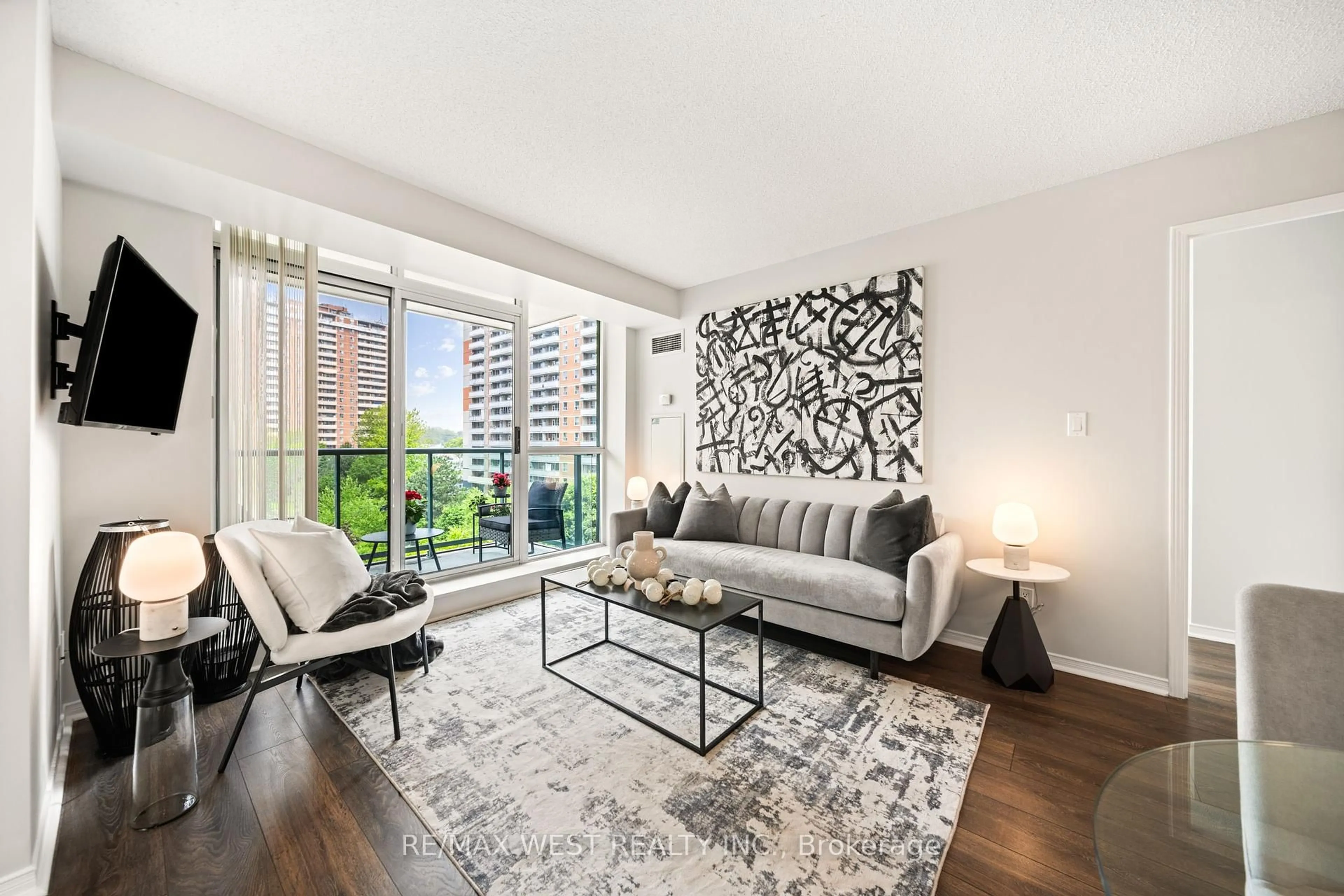 Living room with furniture, unknown for 7 Michael Power Pl #502, Toronto Ontario M9A 0A4