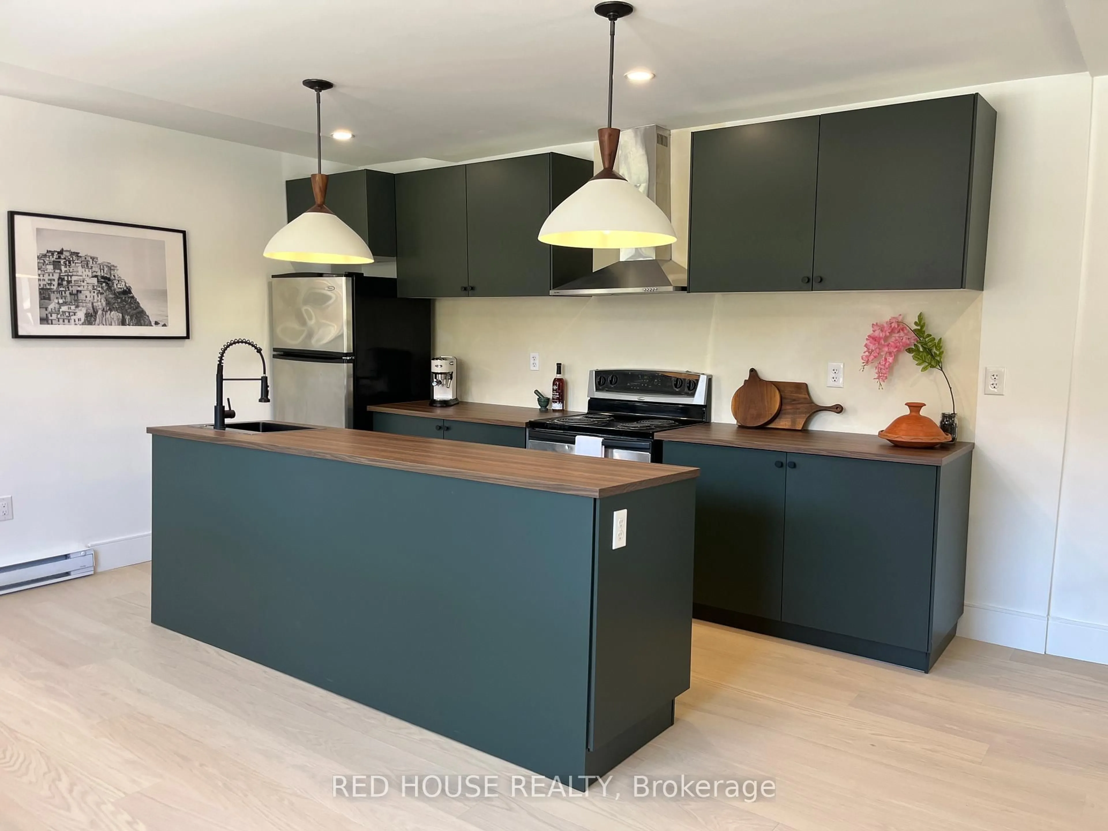 Open concept kitchen, wood/laminate floor for 2 Hilldale Rd, Toronto Ontario M6N 3Y2