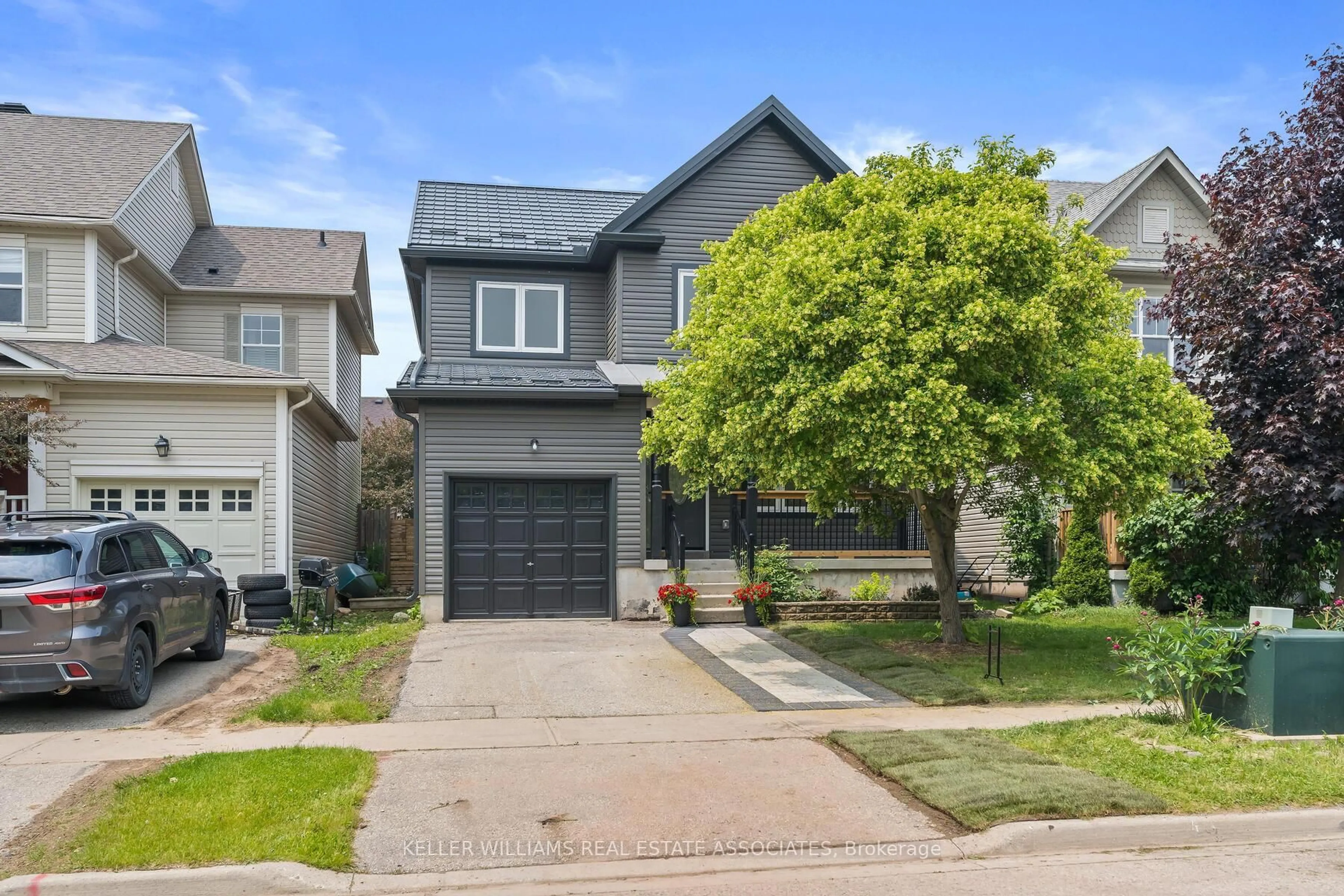 Home with brick exterior material, street for 65 Somerville Rd, Halton Hills Ontario L7J 2Z7