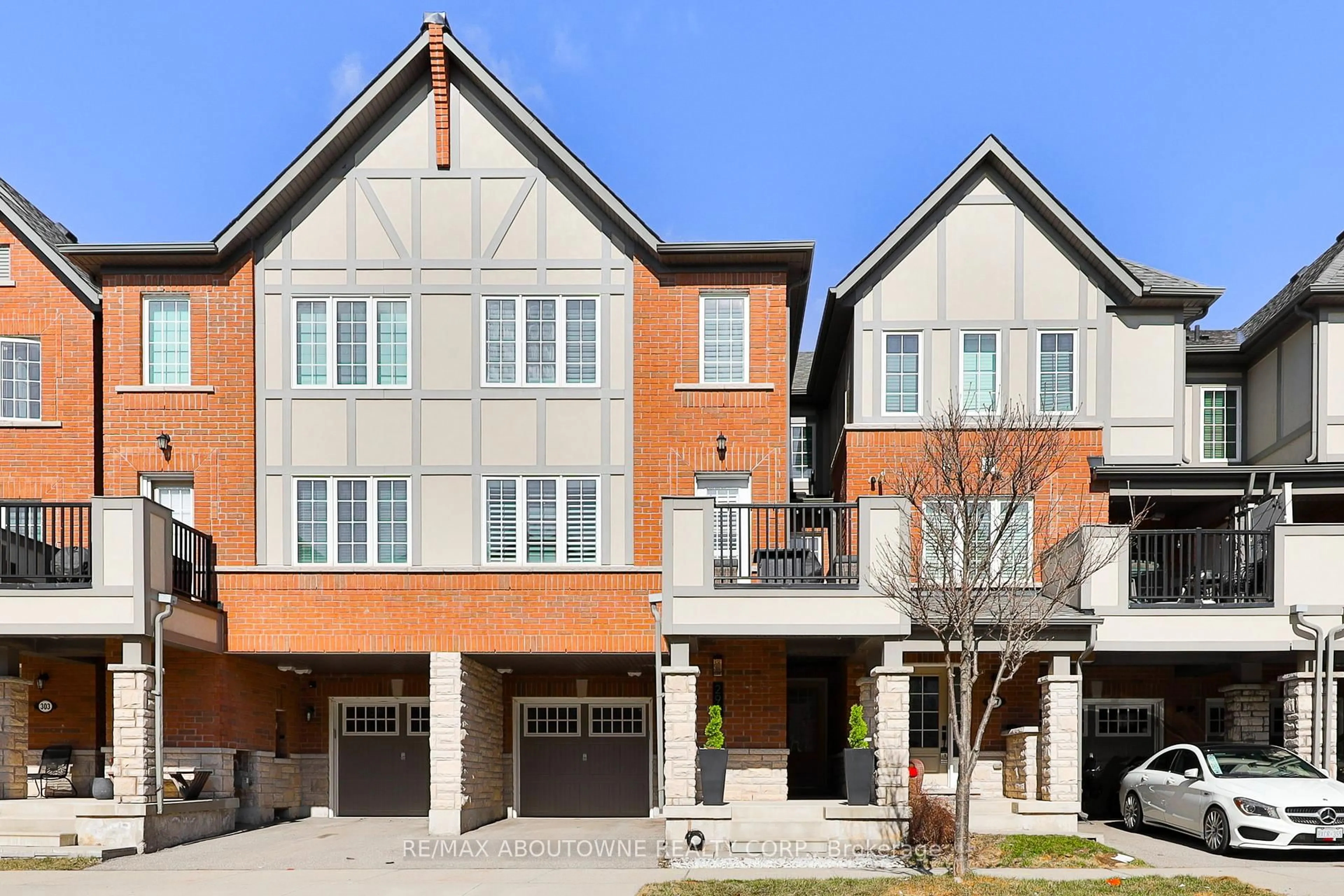 Home with brick exterior material, street for 299 Jemima Dr, Oakville Ontario L6M 0V6