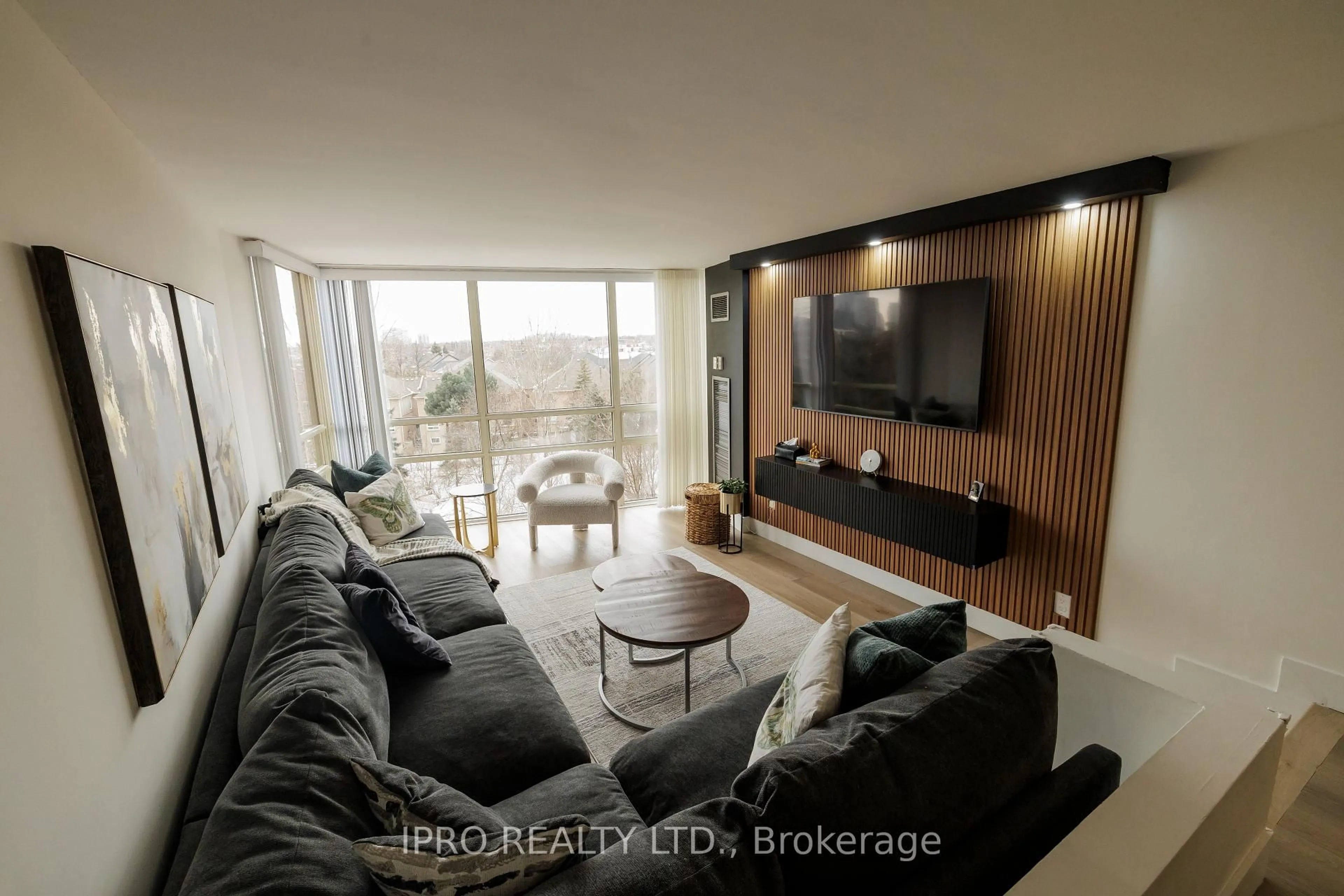 Living room with furniture, wood/laminate floor for 50 Eglinton Ave #408, Mississauga Ontario L5R 3P5