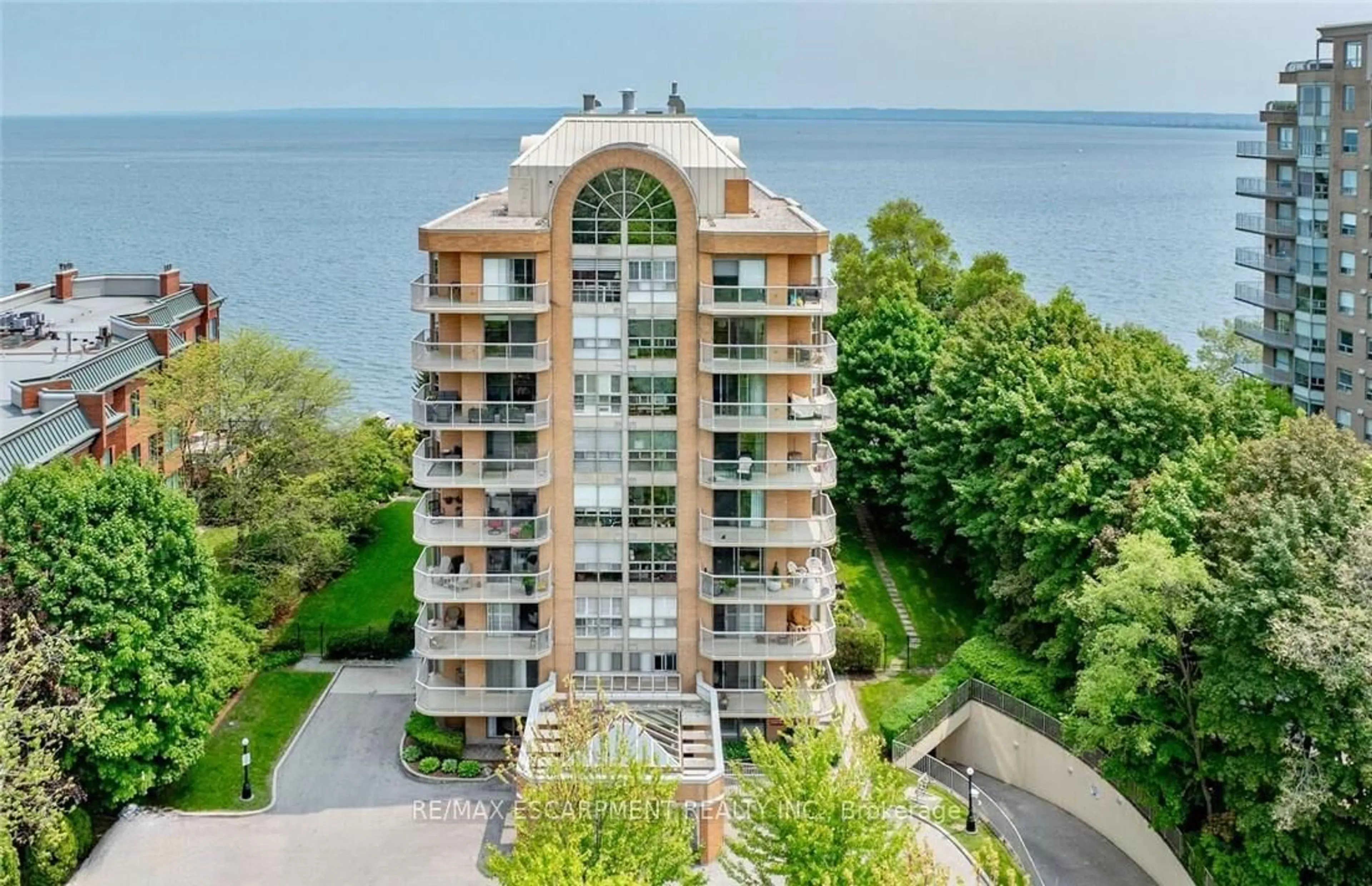 A pic from outside/outdoor area/front of a property/back of a property/a pic from drone, water/lake/river/ocean view for 2210 Lakeshore Rd #803, Burlington Ontario L7R 4J9