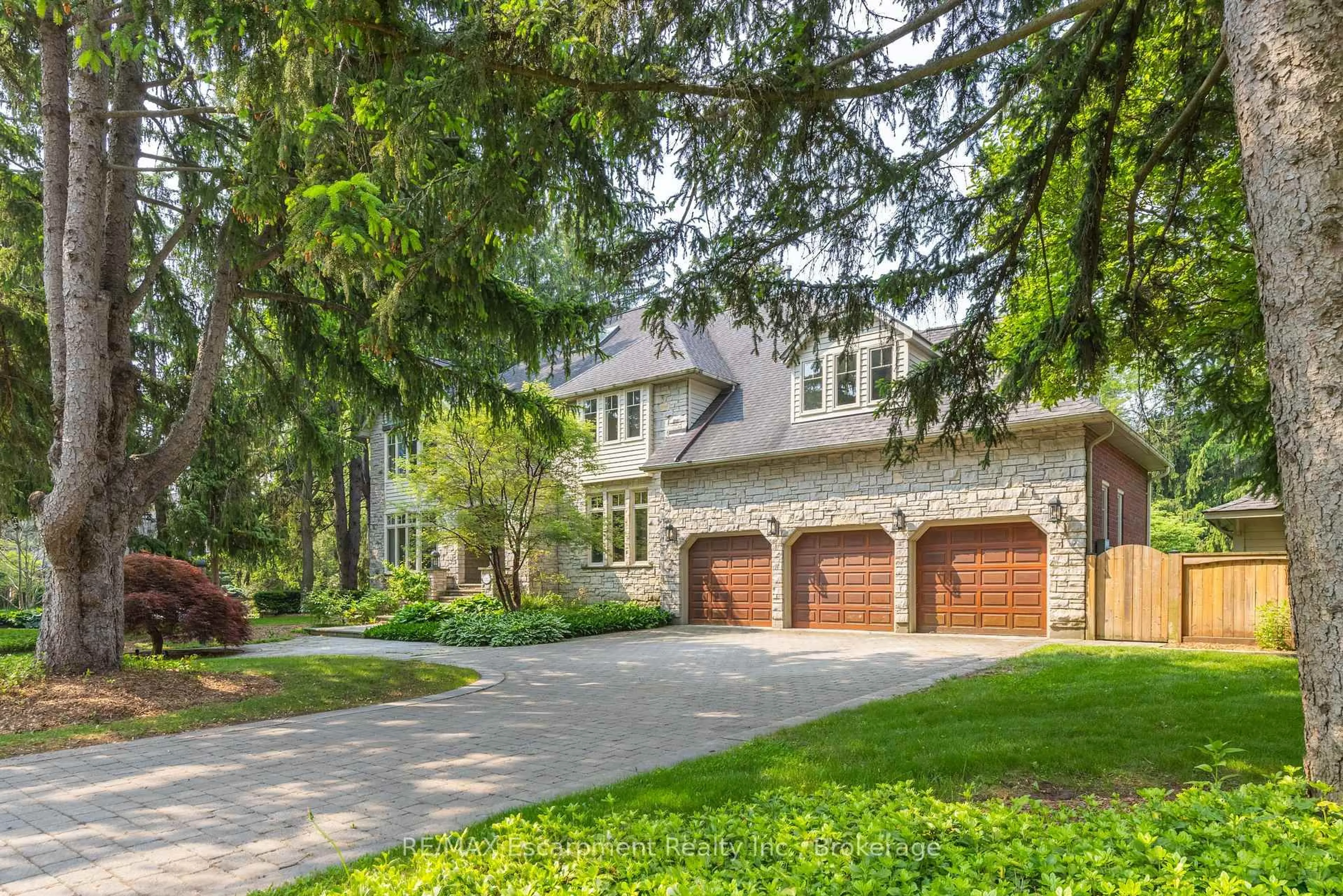 Home with brick exterior material, street for 212 Poplar Dr, Oakville Ontario L6J 4C8