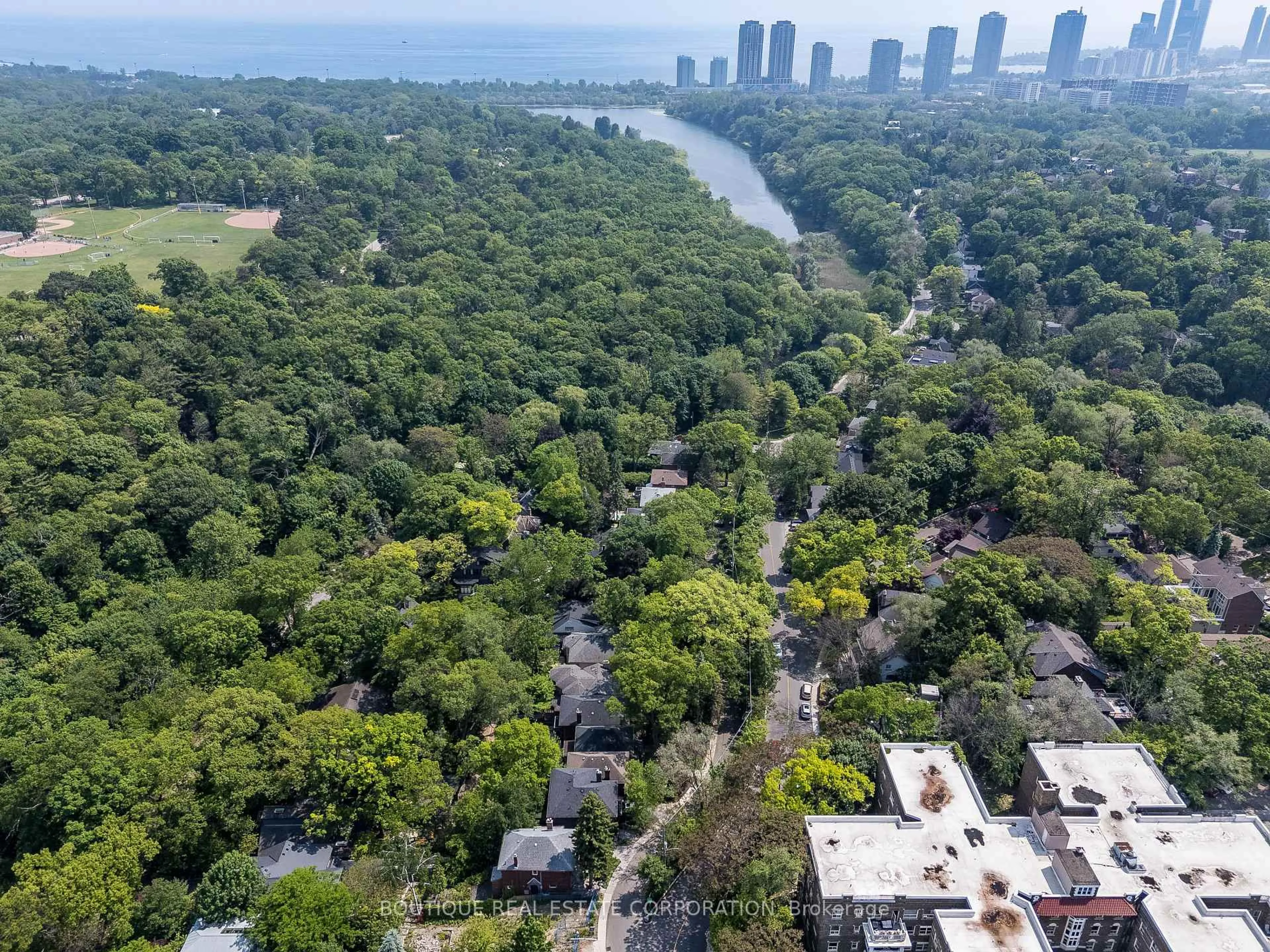 A pic from outside/outdoor area/front of a property/back of a property/a pic from drone, unknown for 373 Ellis Park Rd, Toronto Ontario M6S 2V7