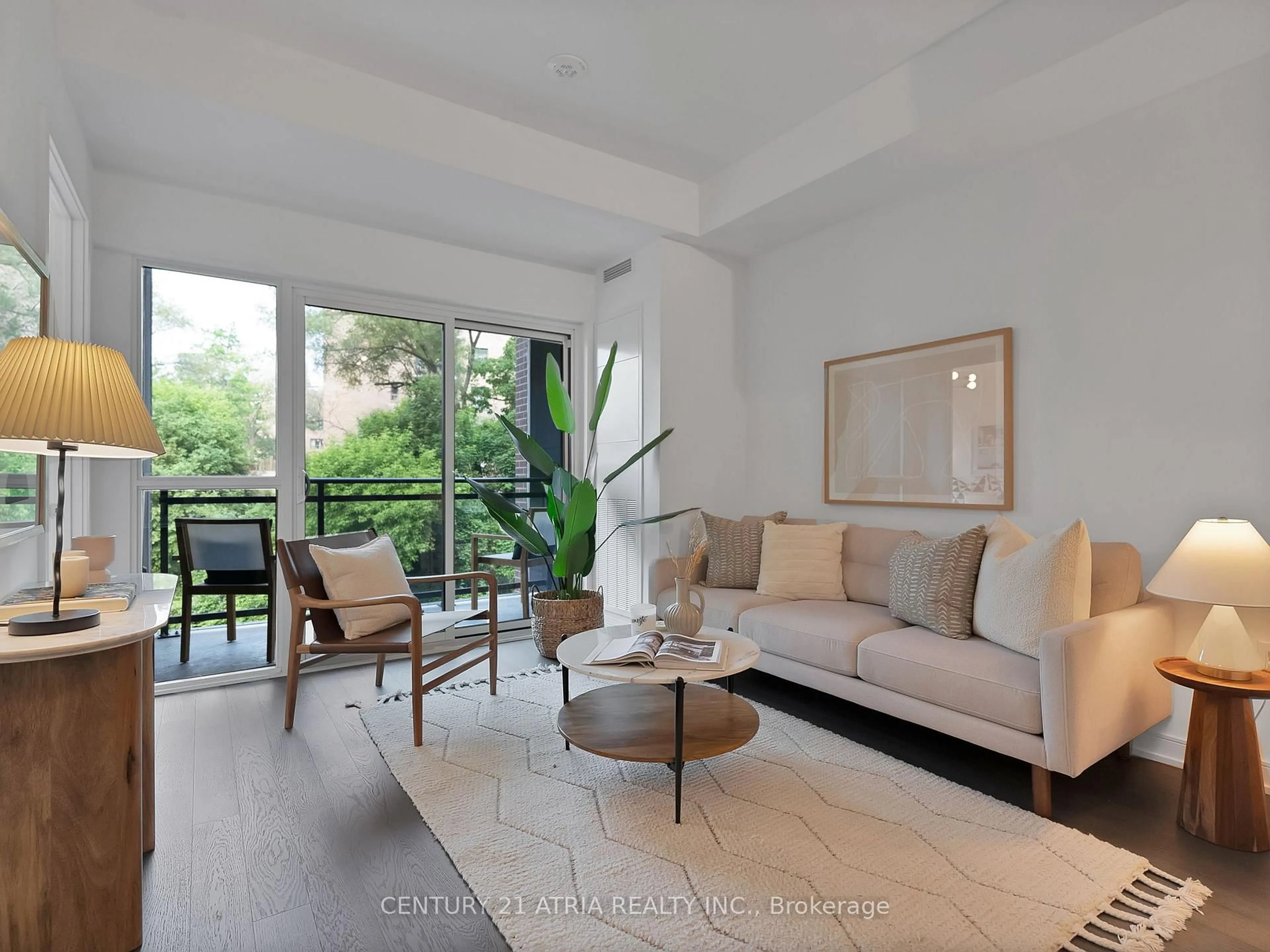 Living room with furniture, unknown for 25 Neighbourhood Lane #405, Toronto Ontario M9Y 0C4