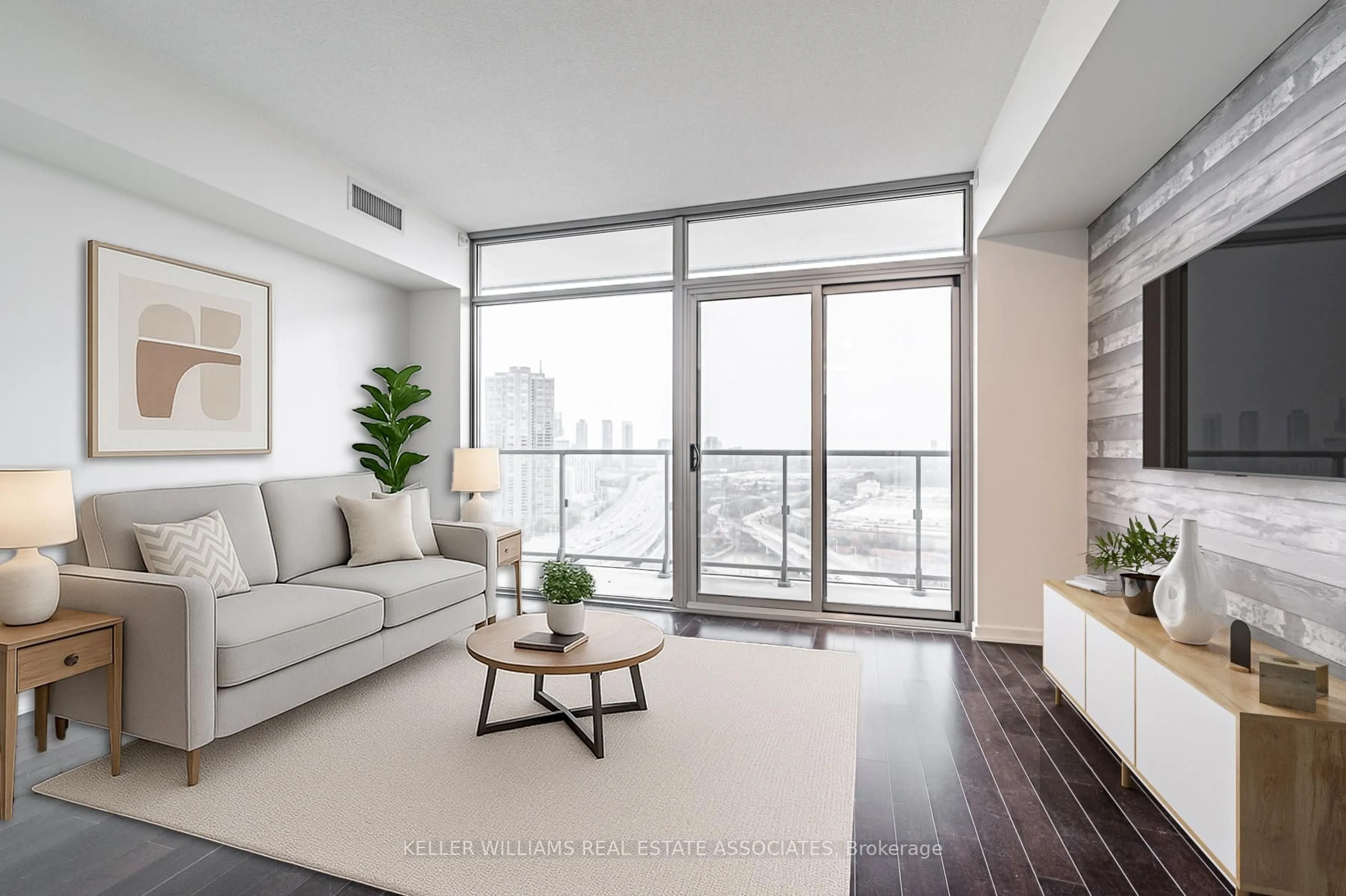 Living room with furniture, wood/laminate floor for 105 The Queensway #2206, Toronto Ontario M6S 5B5
