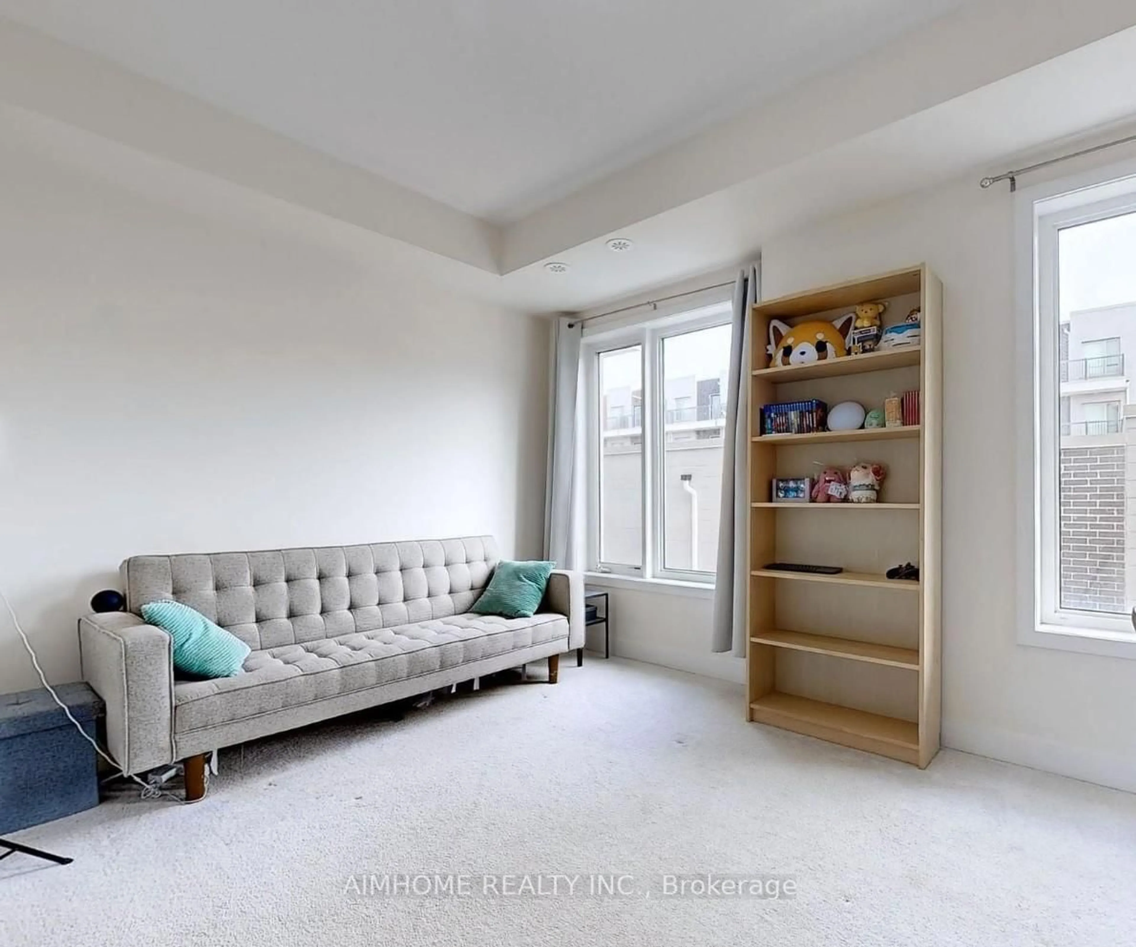 Living room with furniture, unknown for 31 Frederick Tisdale Dr, Toronto Ontario M3K 0C4
