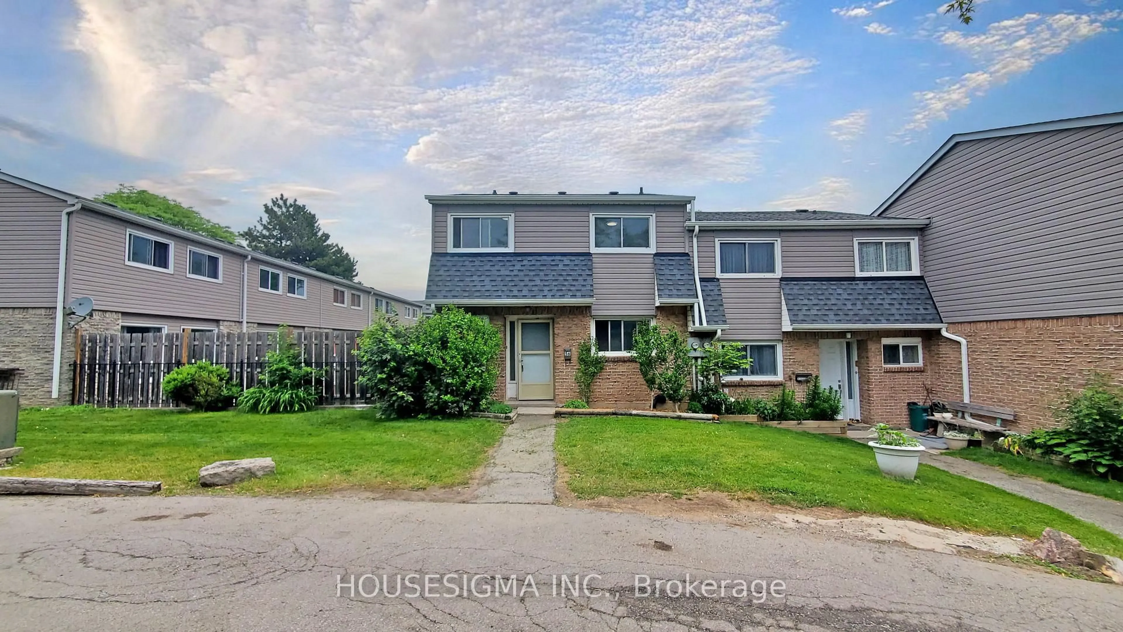 A pic from outside/outdoor area/front of a property/back of a property/a pic from drone, street for 2050 Upper Middle Rd #56, Burlington Ontario L7P 3R9