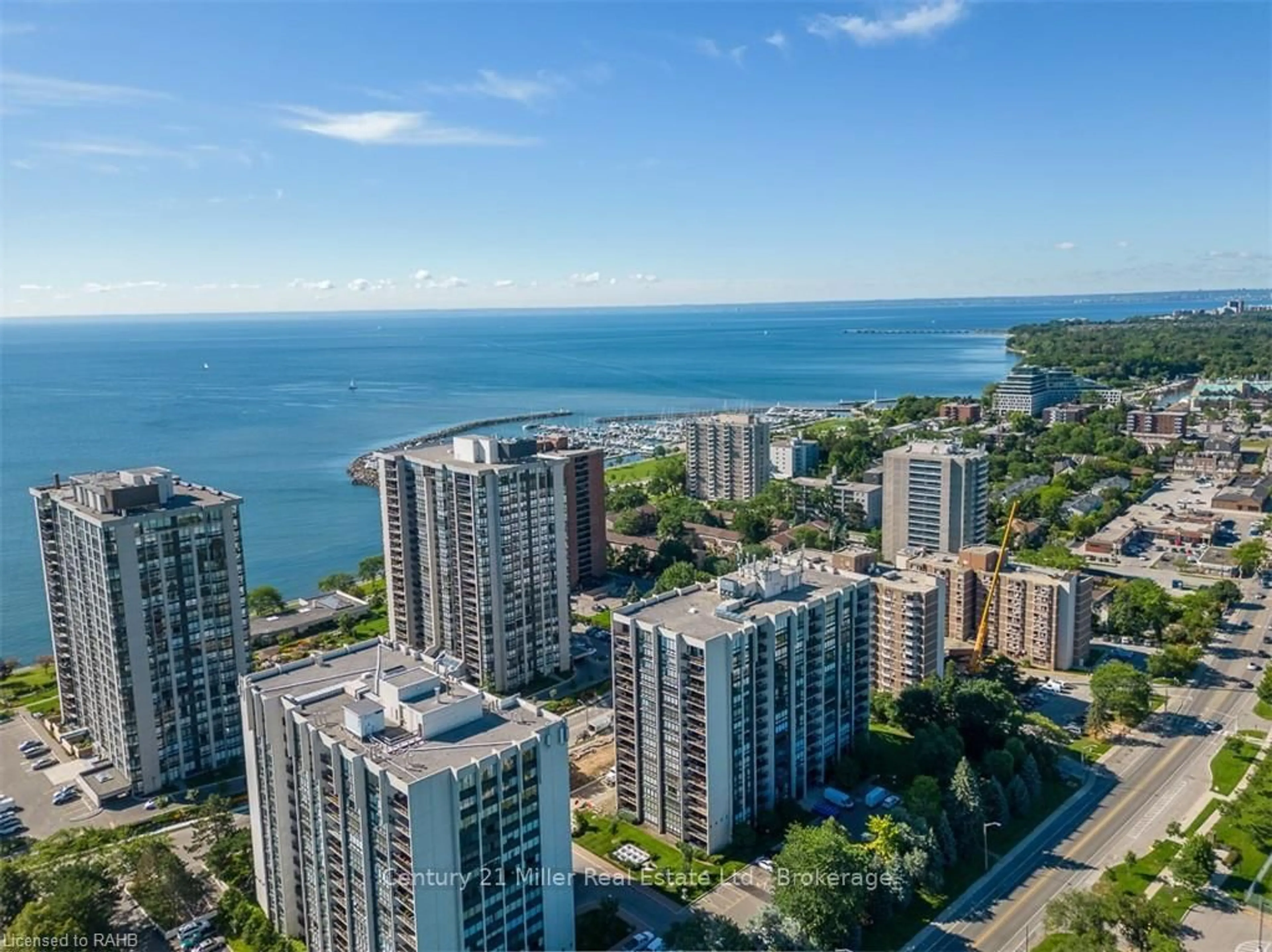 A pic from outside/outdoor area/front of a property/back of a property/a pic from drone, water/lake/river/ocean view for 2185 Marine Dr #203, Oakville Ontario L6L 5L6