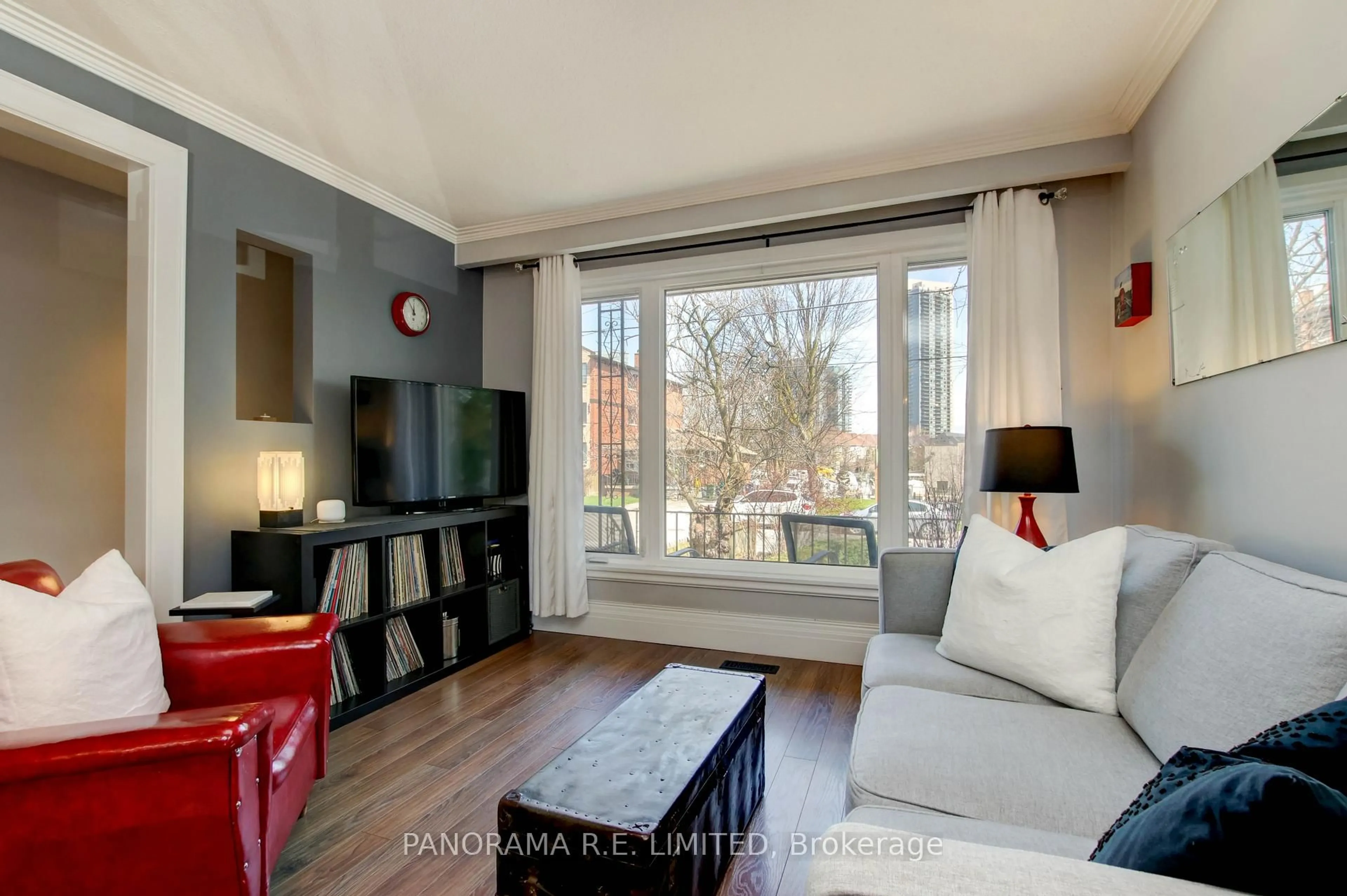 Living room with furniture, wood/laminate floor for 14 Louisa St, Toronto Ontario M8V 2K6