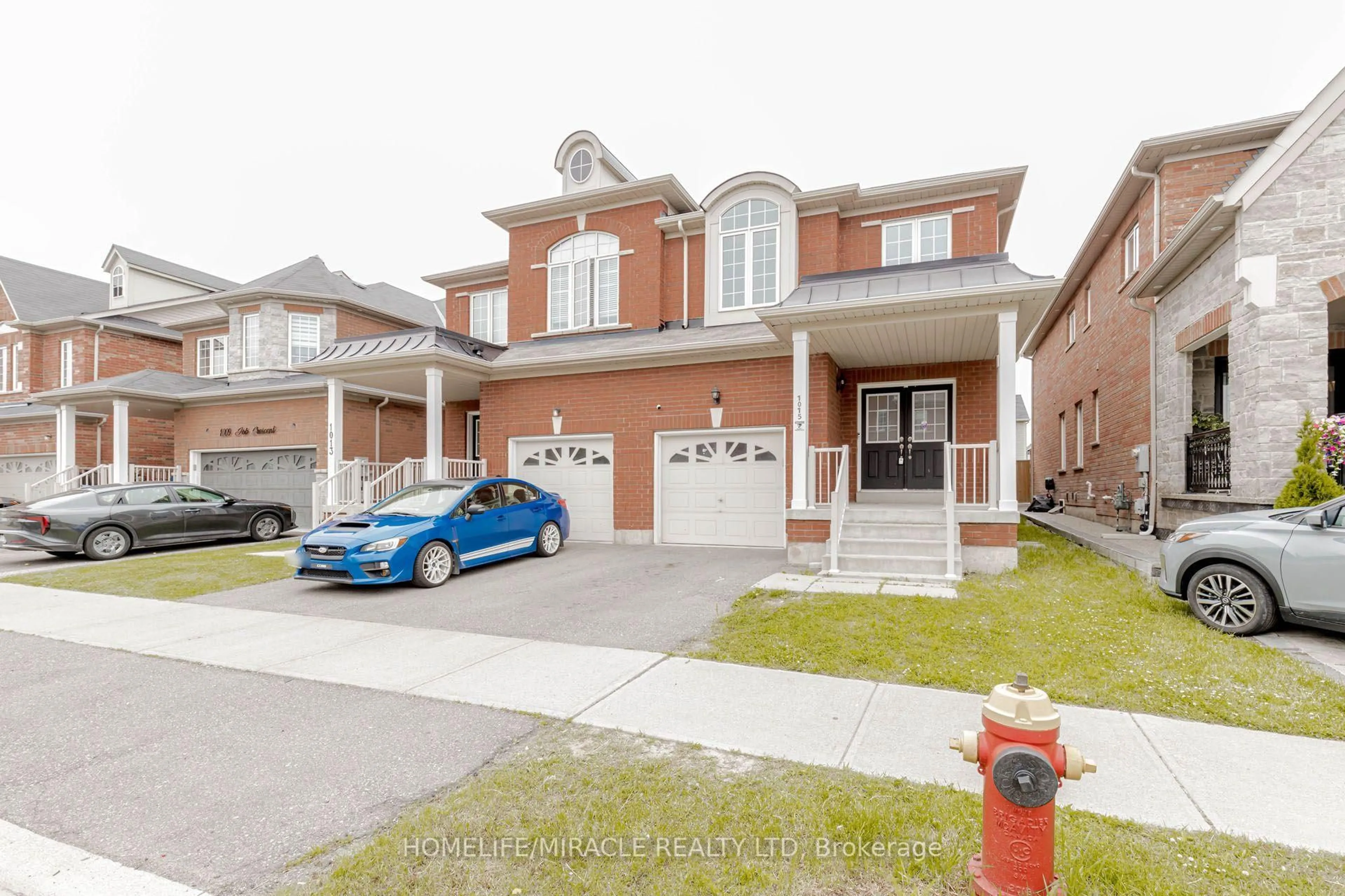 Home with brick exterior material, street for 1015 Job Cres, Milton Ontario L9T 7V1