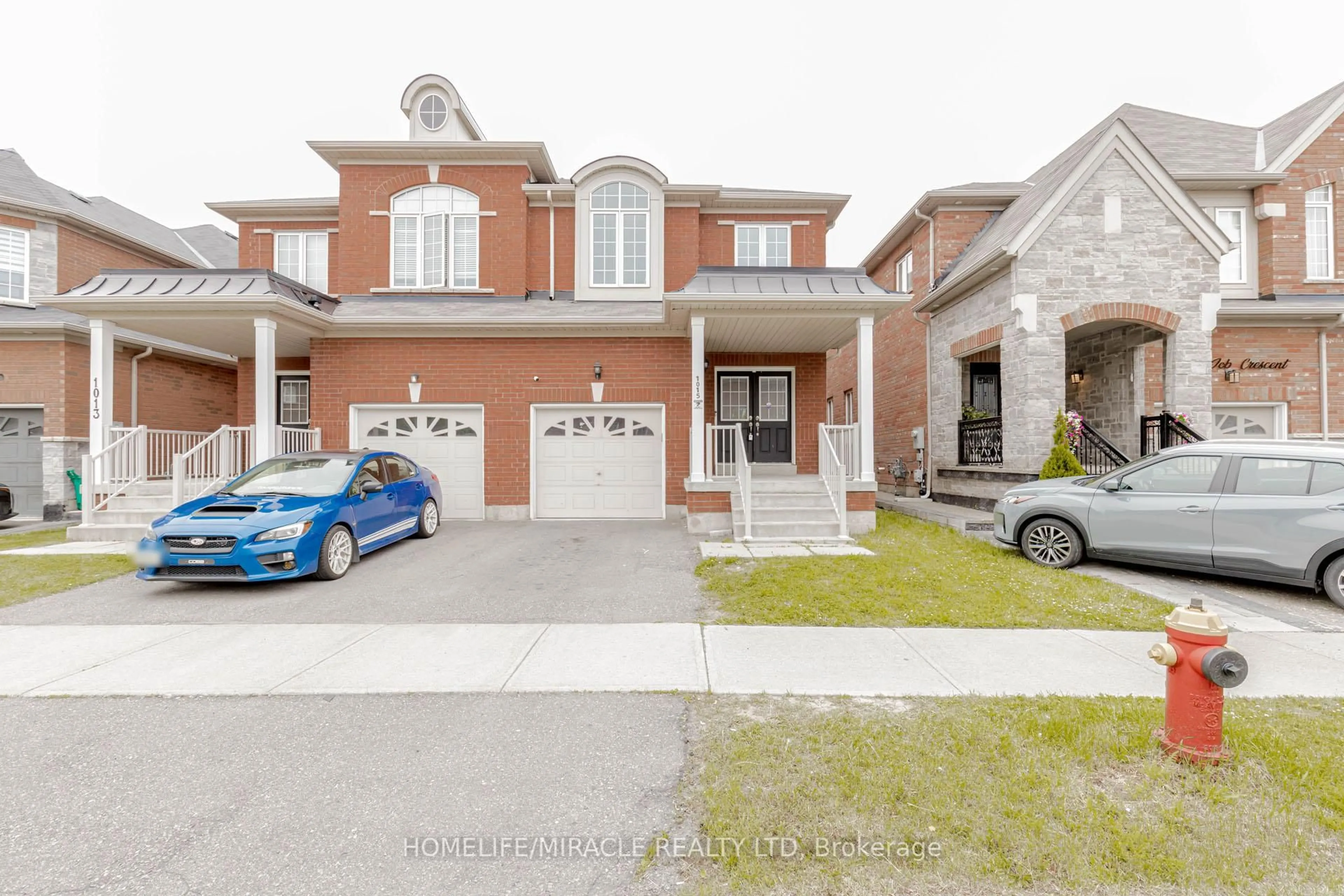 Home with brick exterior material, street for 1015 Job Cres, Milton Ontario L9T 7V1