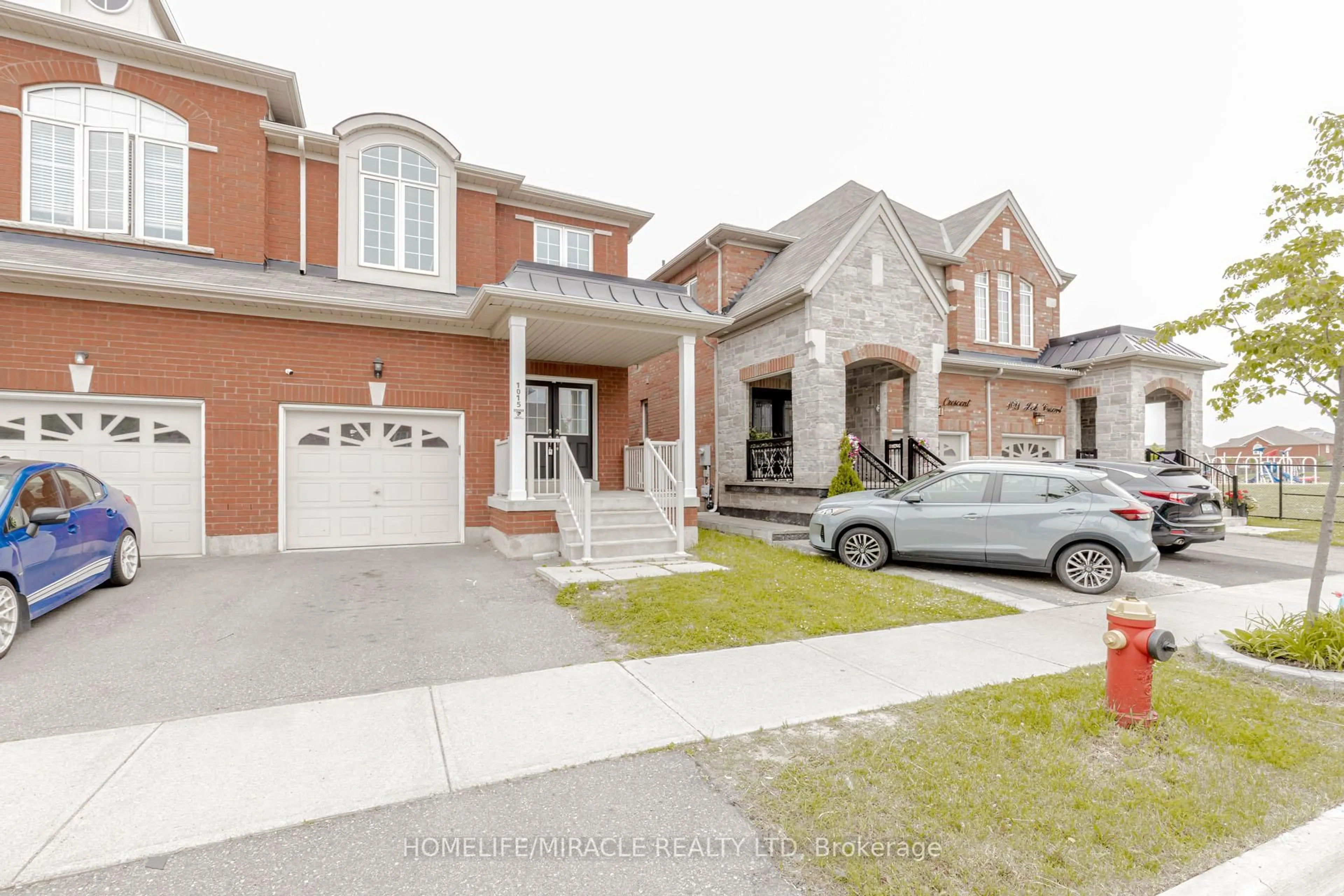 Home with brick exterior material, street for 1015 Job Cres, Milton Ontario L9T 7V1