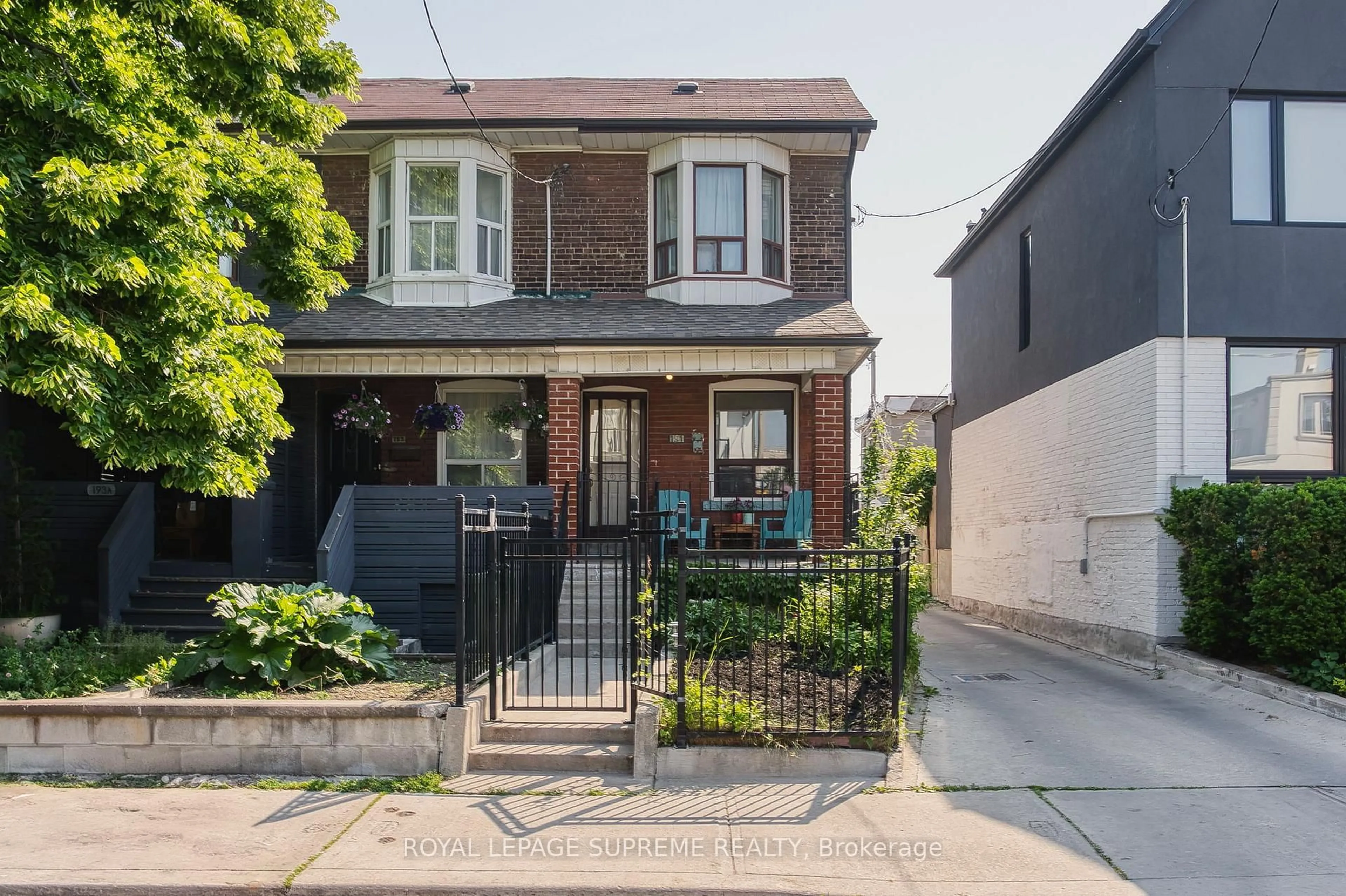 Home with brick exterior material, street for 191 Emerson Ave, Toronto Ontario M6H 3T7