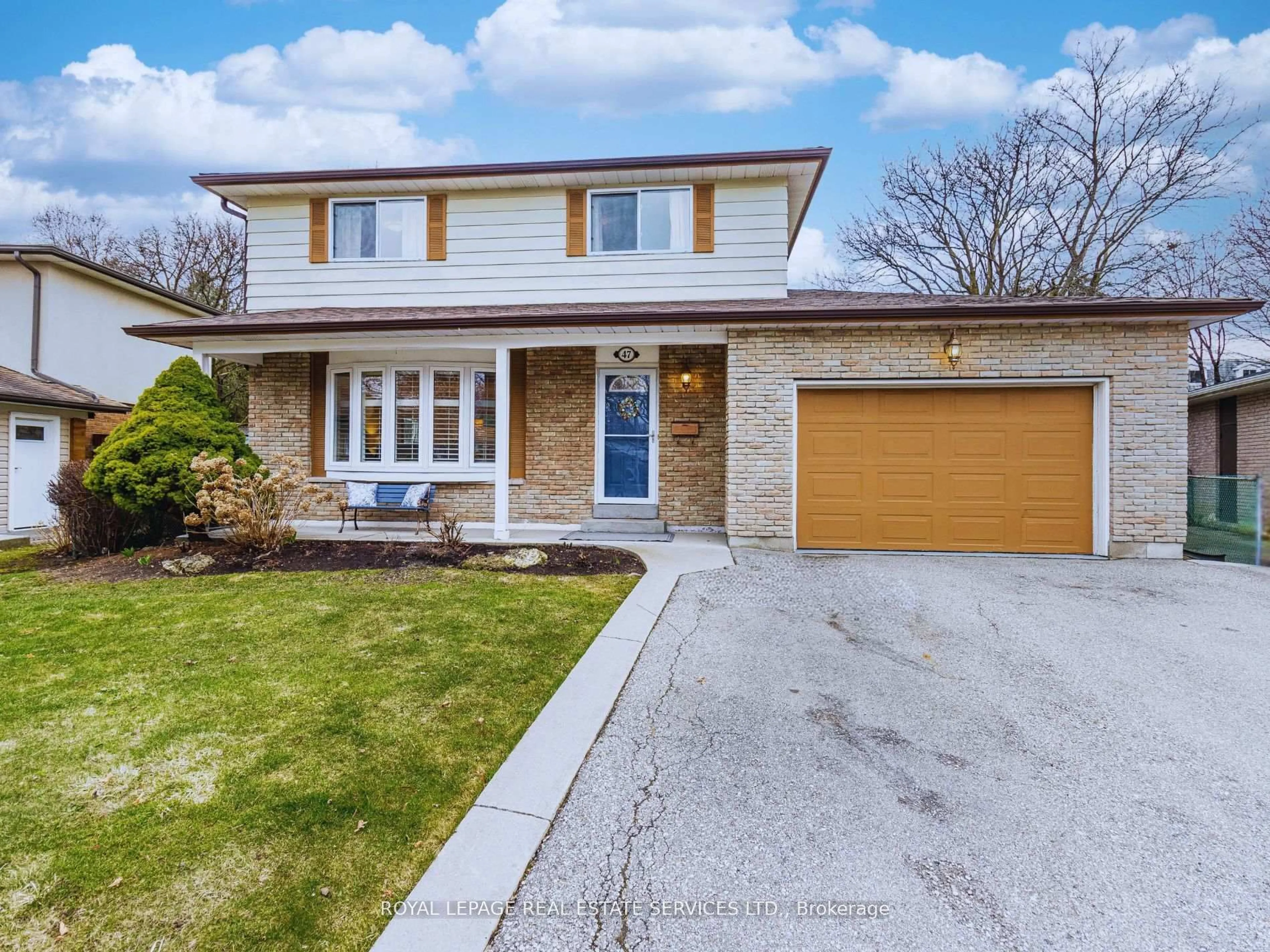 Home with brick exterior material, street for 47 Trotters Lane, Brampton Ontario L6Y 1B5