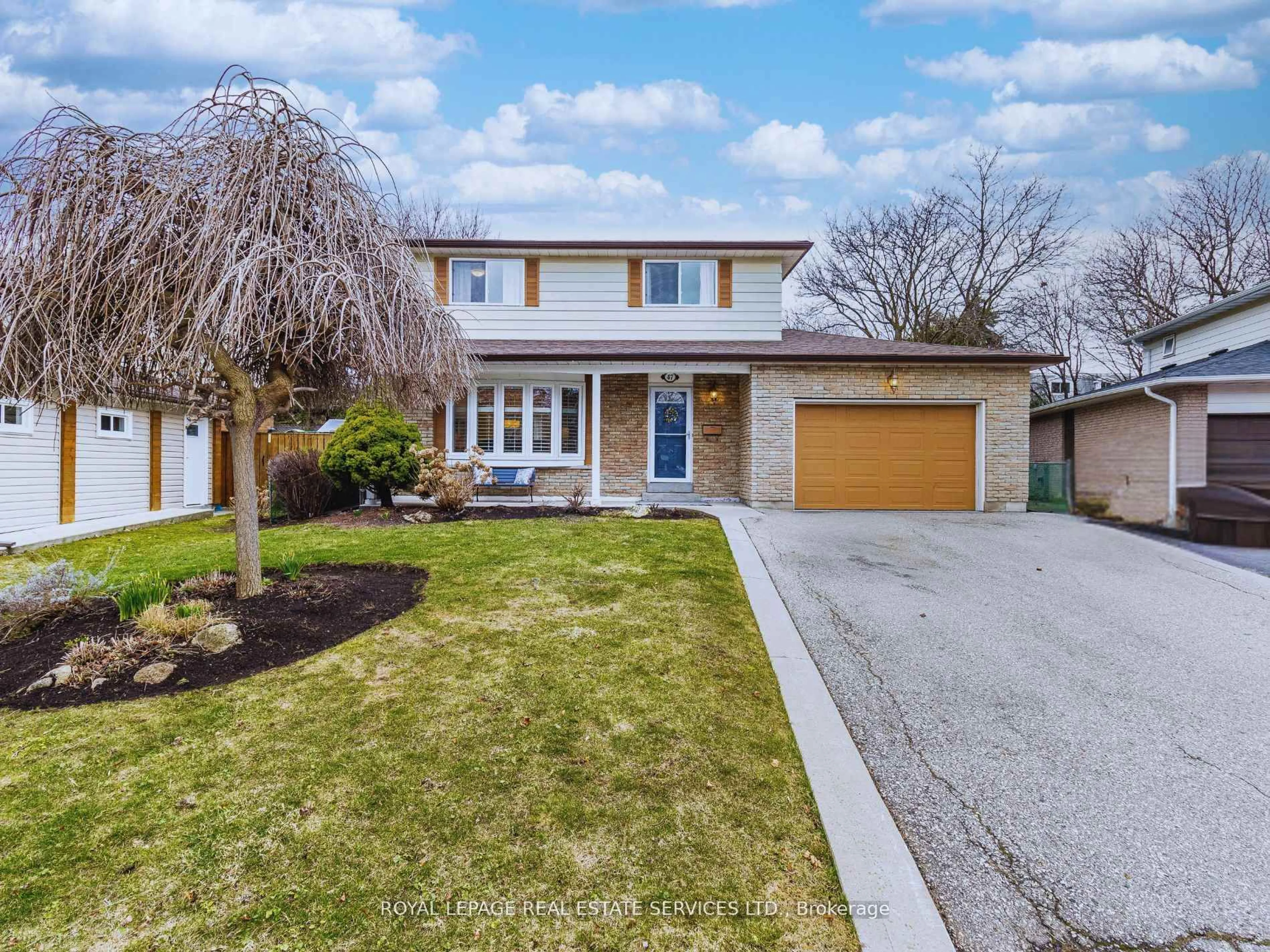 Home with brick exterior material, street for 47 Trotters Lane, Brampton Ontario L6Y 1B5