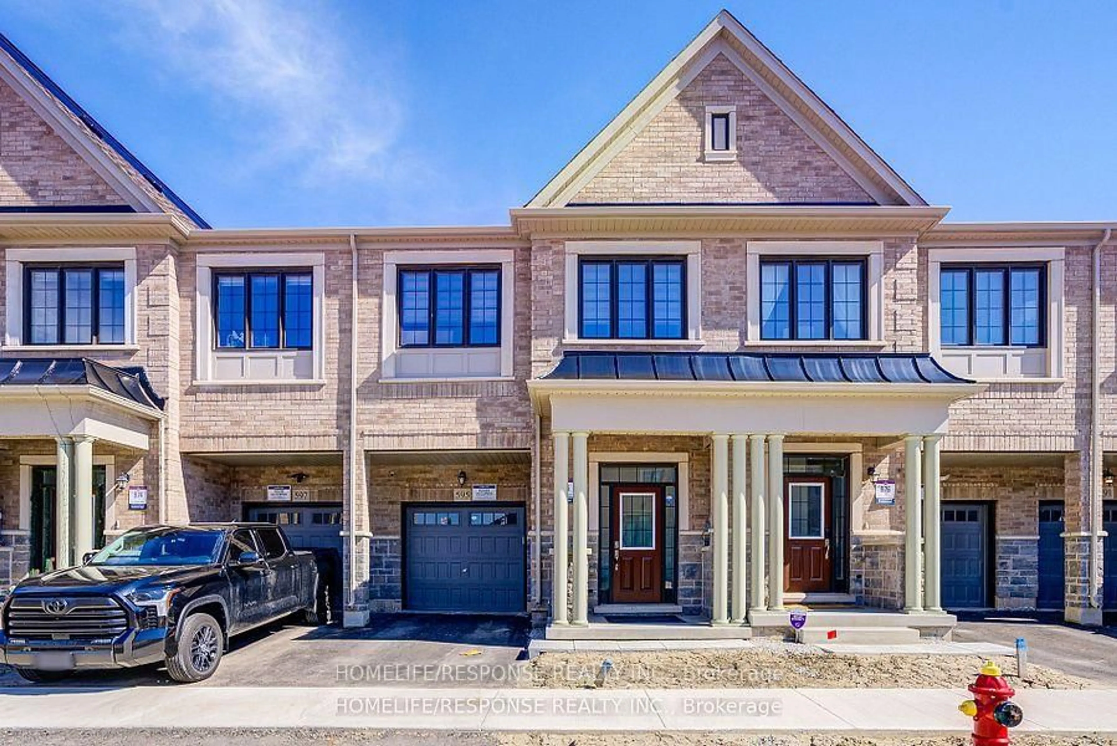 Home with brick exterior material, street for 595 CELANDINE Terr, Milton Ontario L9E 1Z7