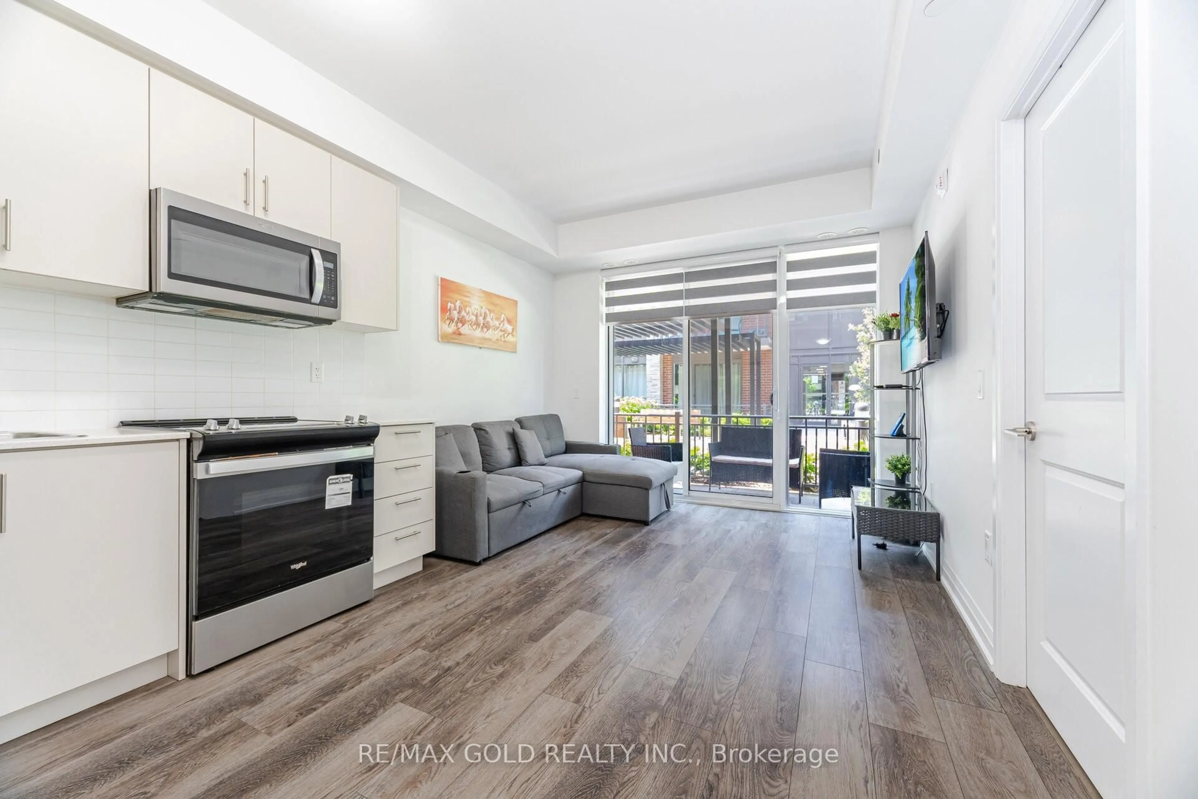 Living room with furniture, unknown for 95 Attmar Dr #113, Brampton Ontario L6P 0Y6