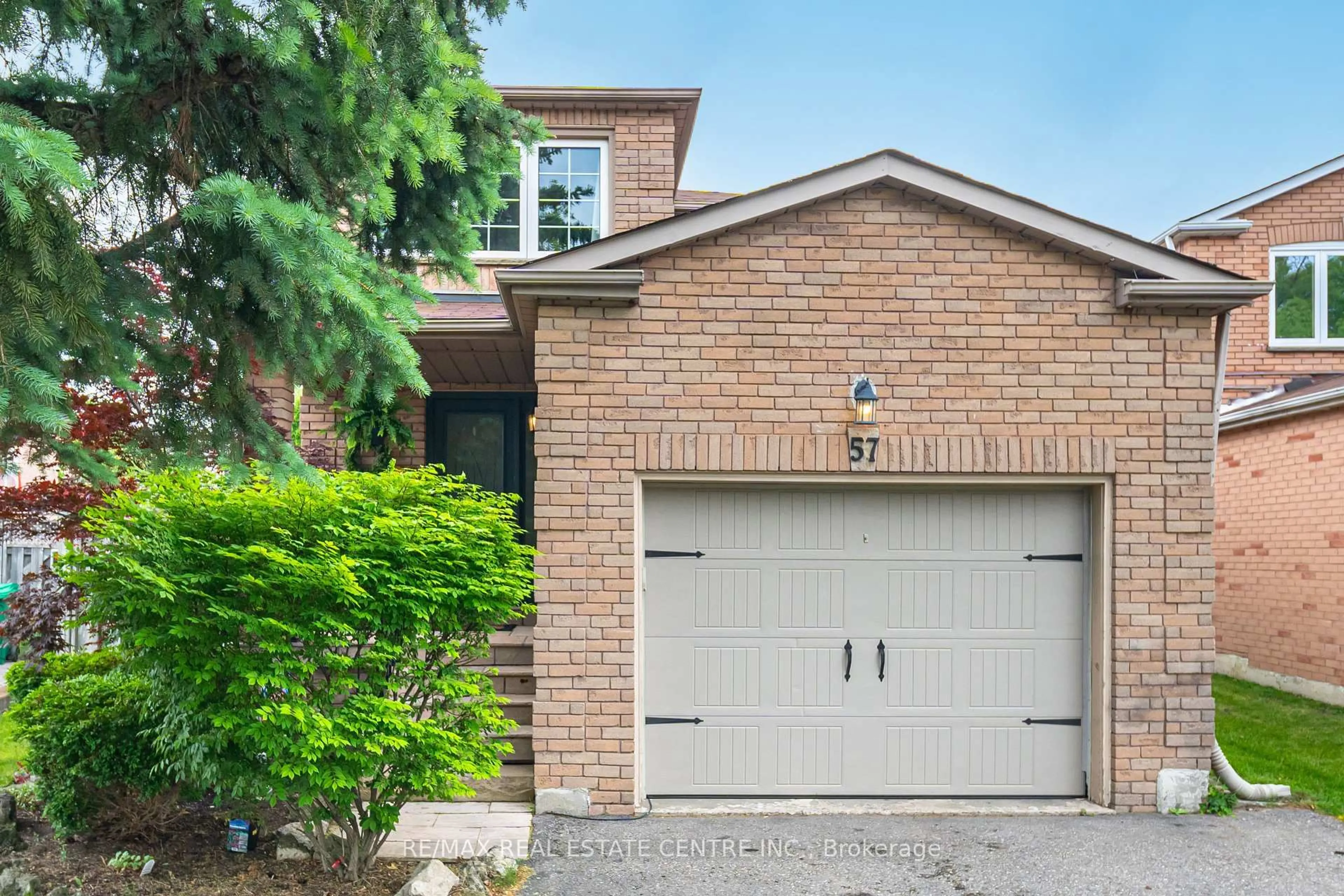 Home with brick exterior material, street for 57 Faywood Dr, Brampton Ontario L6Y 4M1