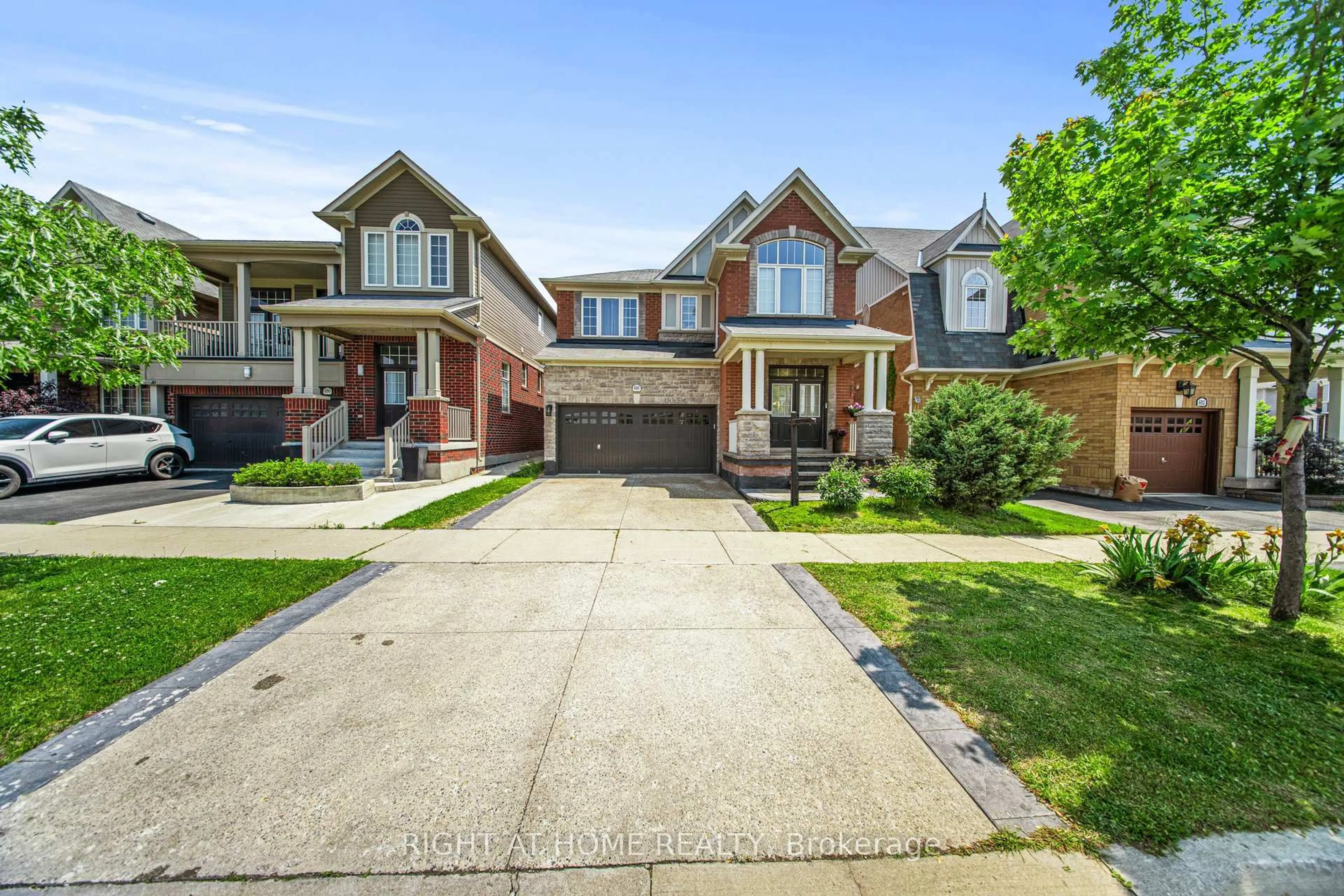 Home with brick exterior material, street for 686 Bolingbroke Dr, Milton Ontario L9T 6Z3